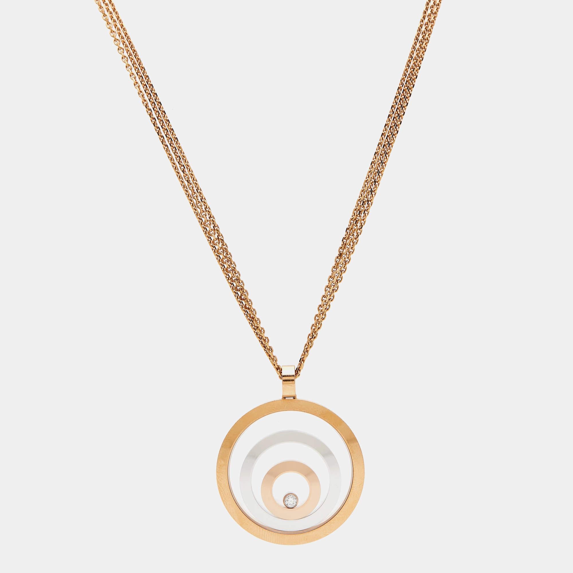 Crafted with precision and finesse, the Chopard Happy Spirit necklace exudes timeless elegance. A harmonious blend of 18k two-tone gold creates a captivating contrast, while delicate craftsmanship enhances its allure. With a floating diamond at its