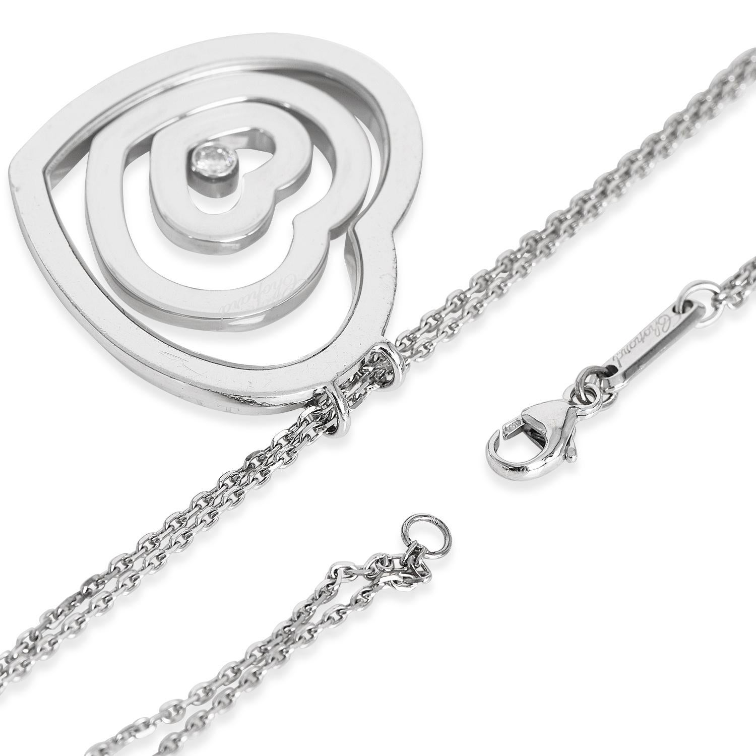  Chopard, collier pendentif Happy Spirit en forme de cœur flottant en or blanc 18 carats et diamants Pour femmes 