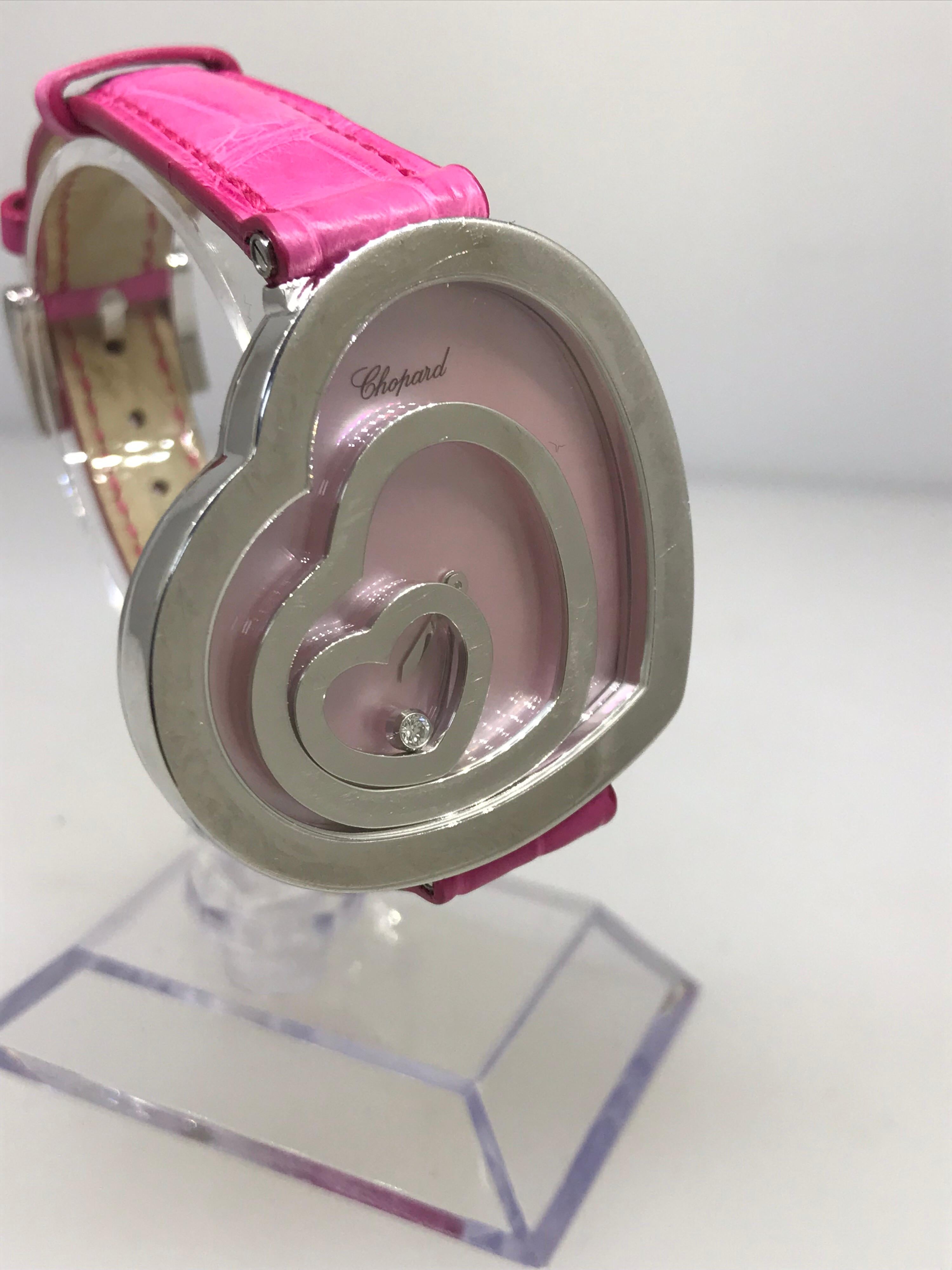 Chopard Happy Spirit Hearts Ladies Watch

Model Number: 20/9056-1001

100% Authentic

New/ Old Stock

Comes with original Chopard Box and Instruction Manual

18 Karat White Gold Case & Buckle

Pink Mother of Pearl Dial

Case Dimensions: 40mm x