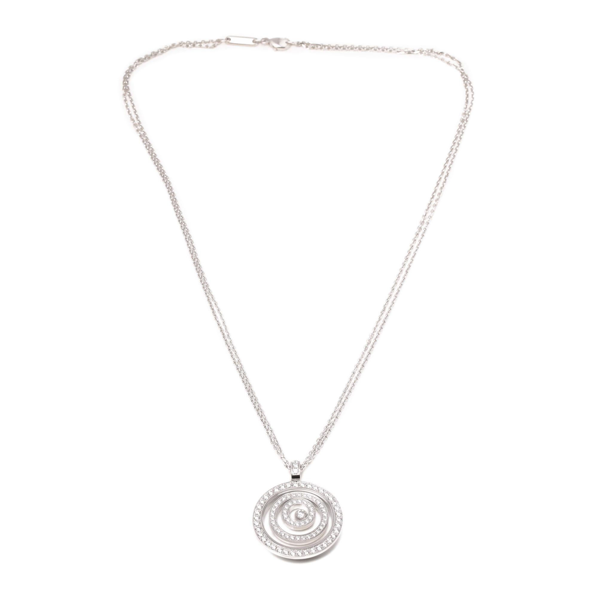 This necklace by Chopard is from their Happy Spirit collection and features three circles of diamonds, with one happy floating diamond between sapphire crystal all made in an 18ct white gold setting. Complete with a Xupes presentation box. Our Xupes