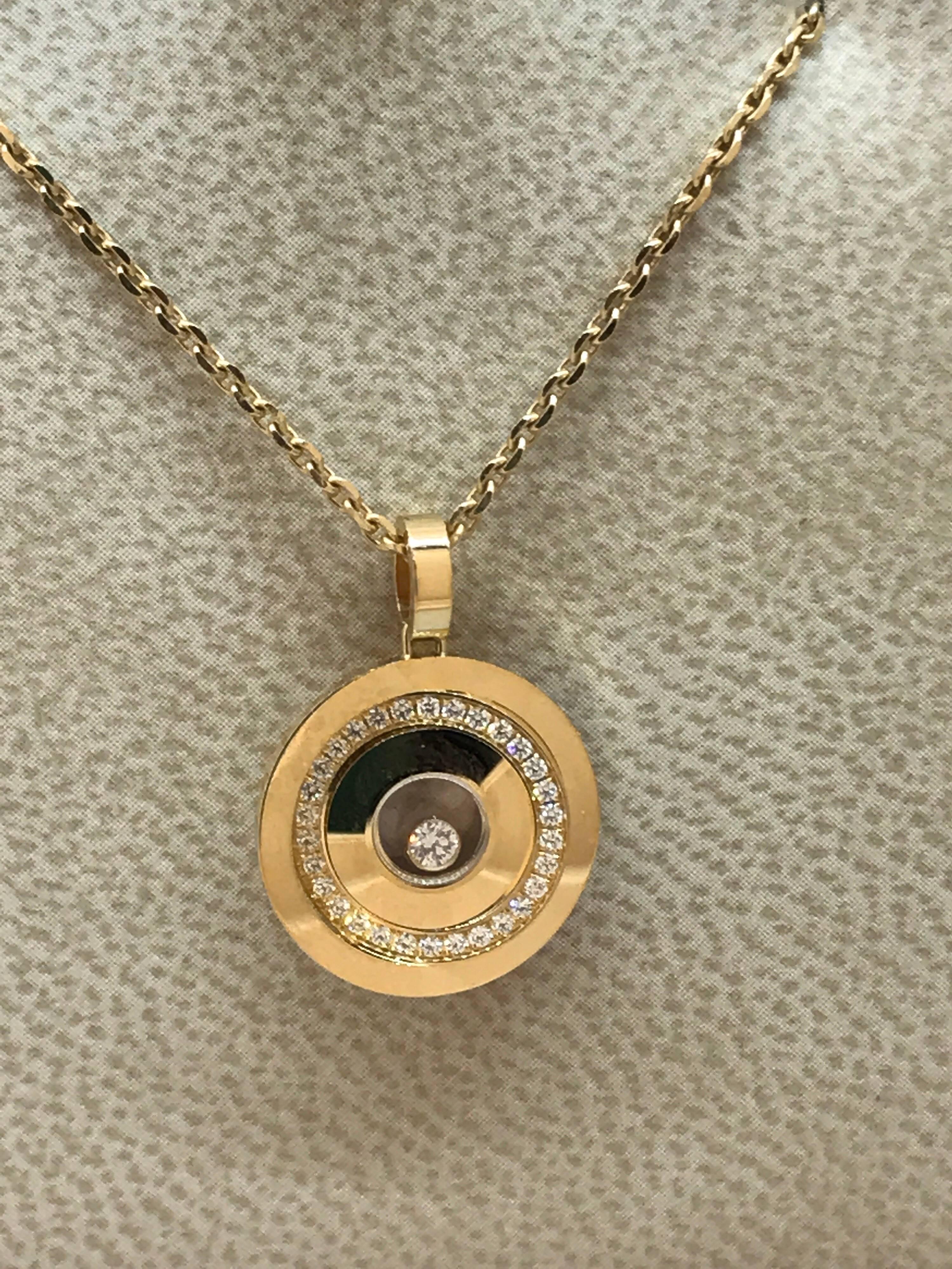 Chopard Happy Spirit Round Circle Pendant / Necklace

Model Number: 79/7990-0003

100% Authentic

Brand New

Comes with original Chopard box, certificate of authenticity and warranty, and jewels manual

18 Karat Yellow Gold (8.30gr)

30 Diamonds on