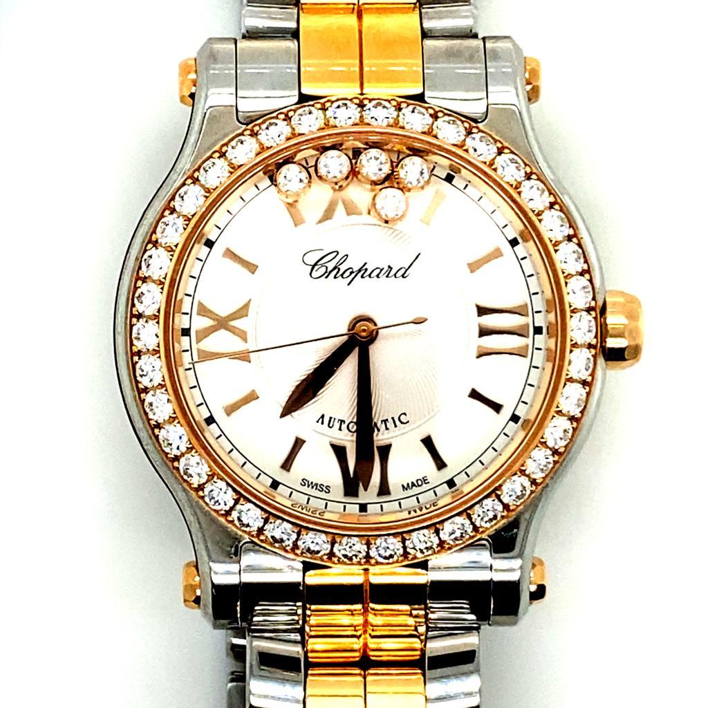 A Chopard Happy Sport 18 karat rose gold and steel ladies watch model no. 8573.

This contemporary Chopard Happy Sport watch features an automatic movement and has been crafted from stainless steel and 18 karat rose gold incorporating Chopard's