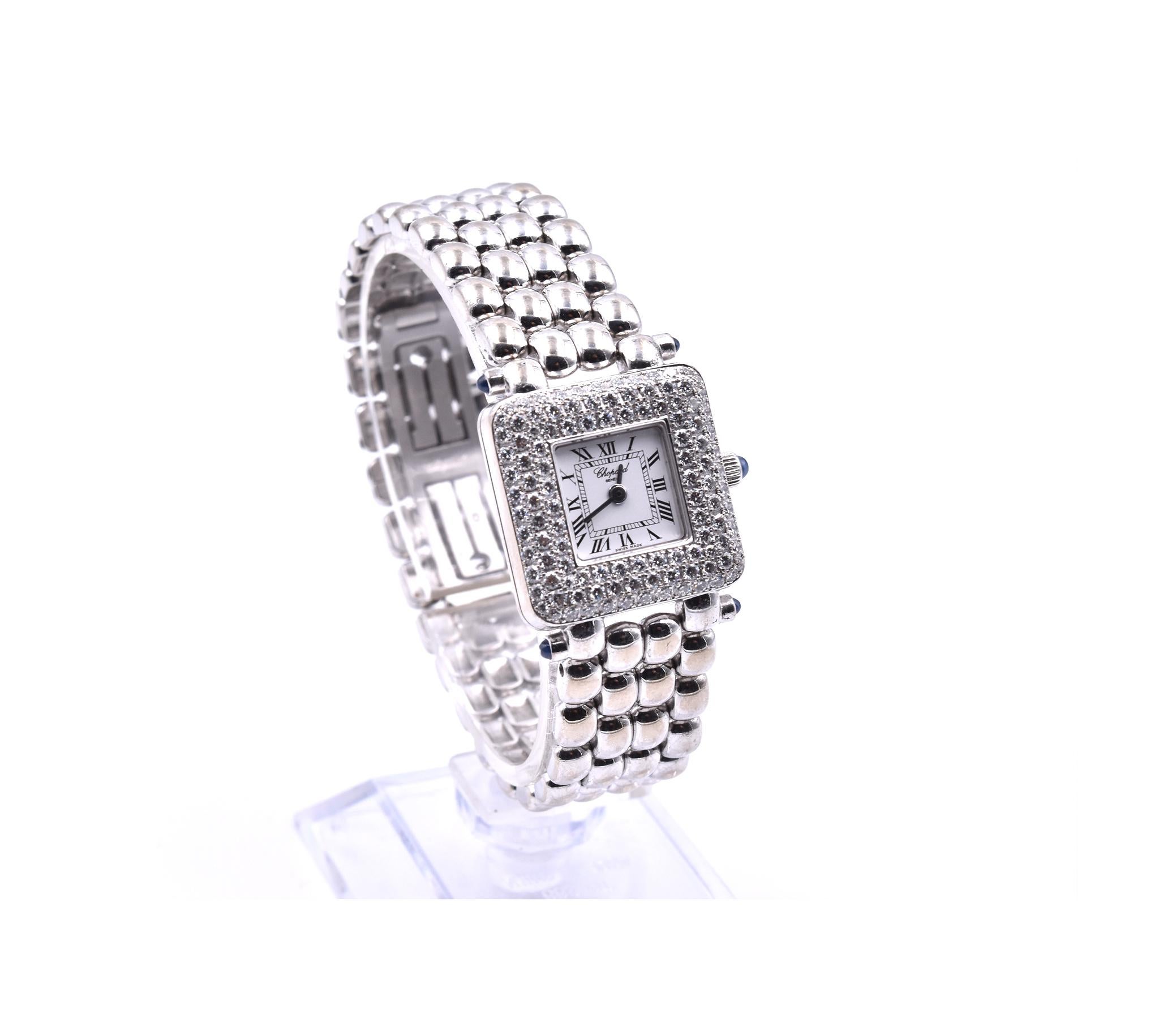 Movement: quartz
Function: hours, minutes
Case: 24mm 18k white gold case, diamond bezel, sapphire protective crystal, pull/push crown
Band: 18k white gold bracelet with double fold down clasps
Dial: white dial, black Roman numerals, black