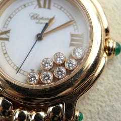 Chopard Happy Sport Uhr aus 18 Karat Gelbgold mit Diamanten und Smaragden