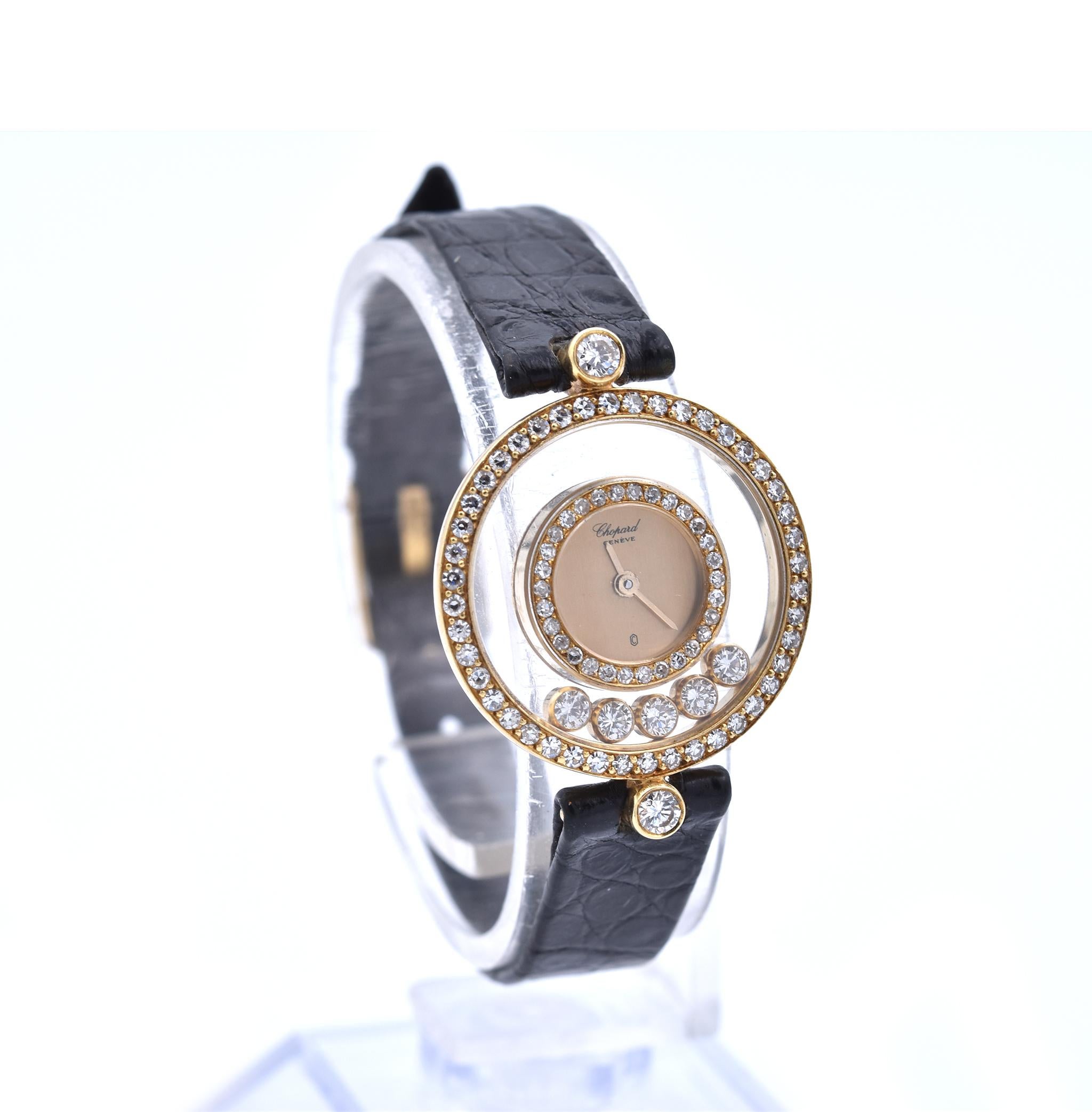 Movement: quartz
Function: hours, minutes
Case: 23mm yellow gold case, floating diamonds, sapphire protective crystal, two diamond bezels
Band: Chopard black leather strap with gold buckle, watch will fit a 7 ½ inch wrist
Dial: yellow gold dial, no