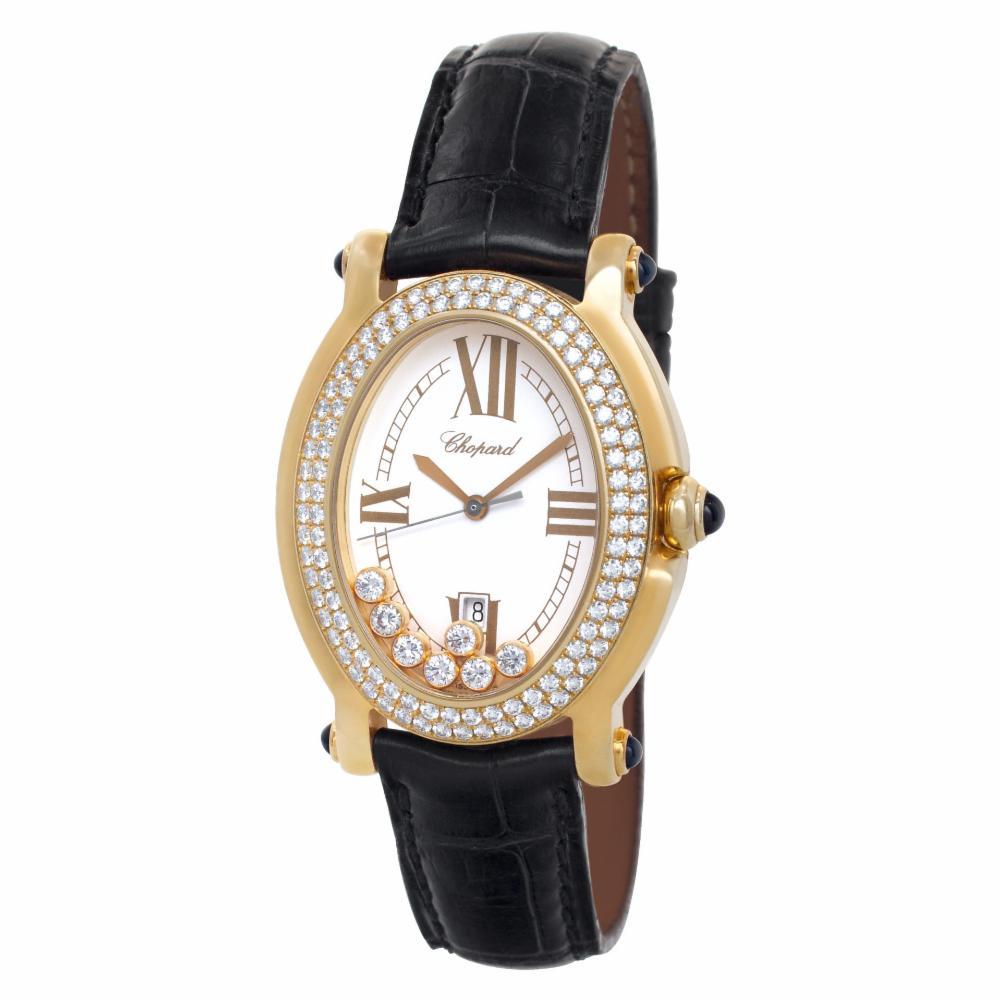 Ladies Chopard Happy Sport in 18k with original double row diamond bezel and 7 floating diamonds under the glass on an aligator strap with tag buckle. Quartz w/ sweep seconds and date. 32 mm case size. Ref 27/7012-23. Circa 2000s. Fine Pre-owned