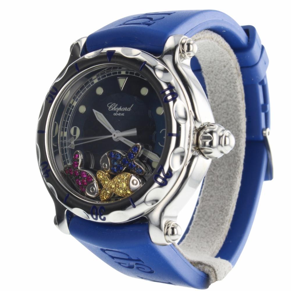 Chopard Happy Sport Reference #:28/8347-8. Chopard Happy Sports Fish 38 mm Steel 38 mm Watch 8347 Pave Sapphires & Ruby Fish. Verified and Certified by WatchFacts. 1 year warranty offered by WatchFacts.
