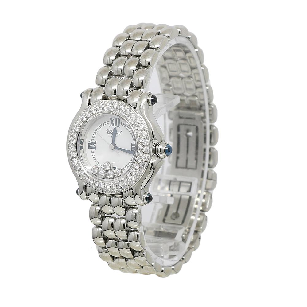 Stainless Steel Case With A Stainless Steel Bracelet. Fixed Diamond Bezel With 80 Diamonds Weighing 1.40 Carats Total Weight And 5 Floating Diamonds weighing .39 Carats Total Weight, White Dial With Blue Hands And Blue Roman Numerals Hour Markers.