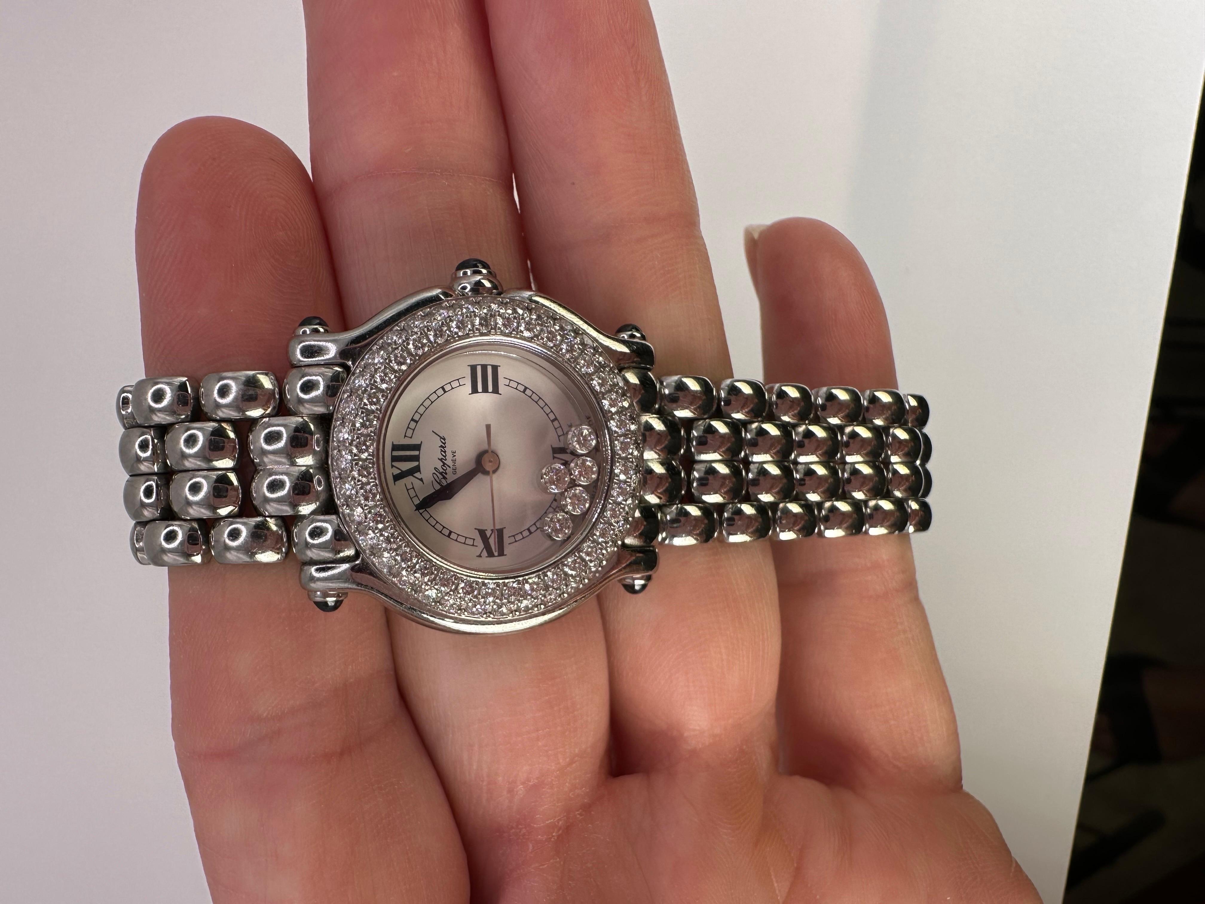 Beautiful Chopard Happy Sport watch with 5 diamond on dial as well as pave set diamonds around the dial on the case, original by Cartier. Authentic Chopard watch!
Details: 27/8294-23
Model 832164. 8245
Metal: stainless steel
Item #