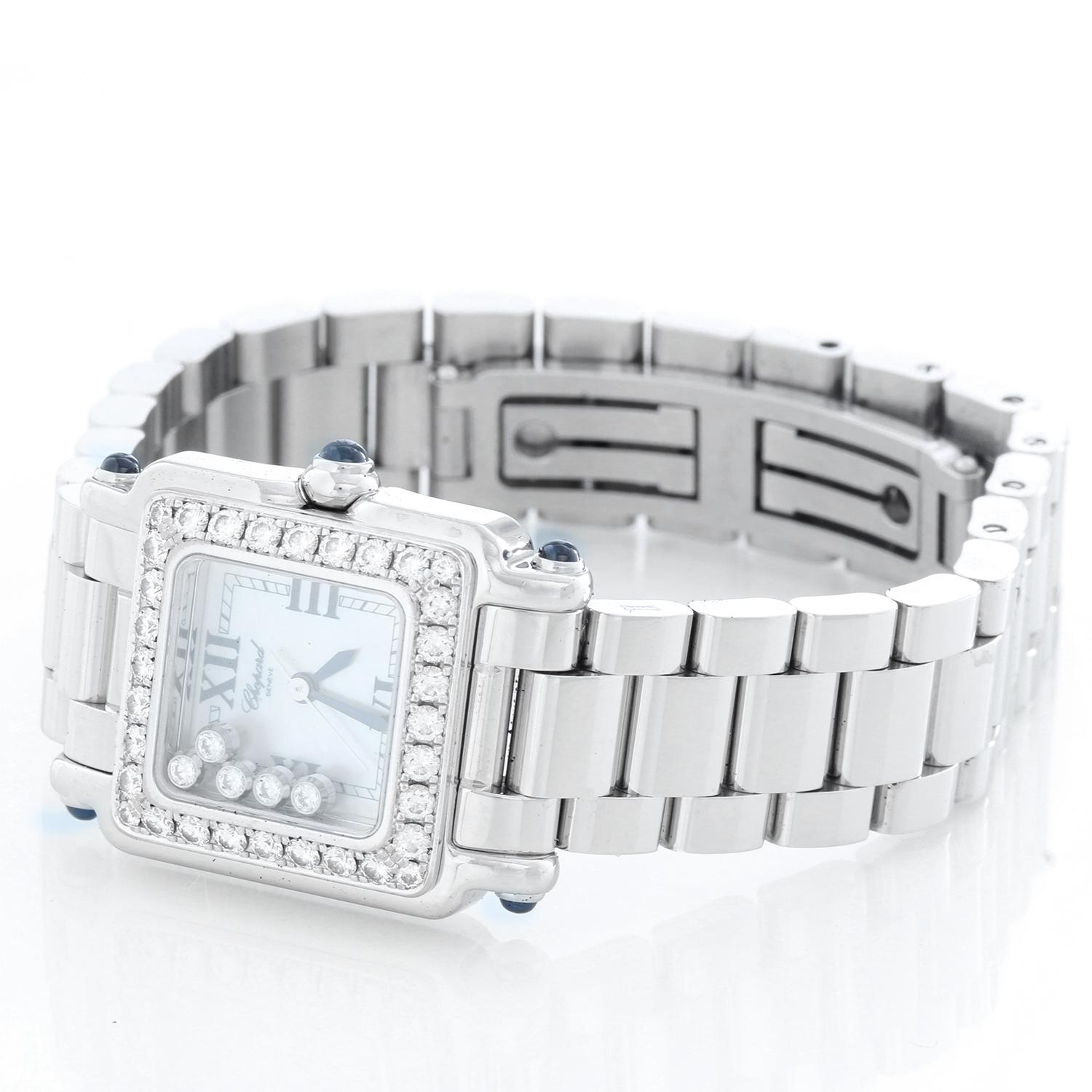 Chopard Happy Sport Ladies 5 Floating Diamonds Stainless Steel Watch 27/8894-23/11 - Quartz. Stainless steel with diamond set white gold bezel  (28mm x 31mm). Mother of Pearl dial with black Roman numerals and 5 floating diamonds. Stainless steel