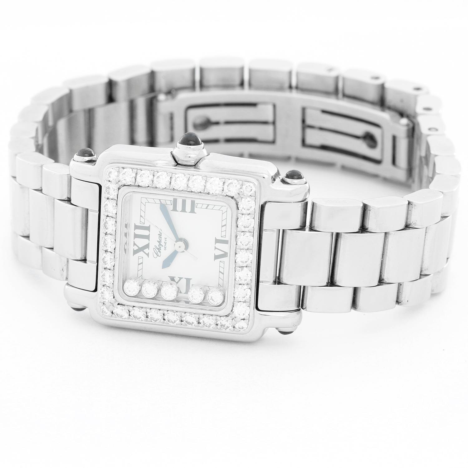 Chopard Happy Sport Ladies 5 Floating Diamonds Stainless Steel Watch 27/8894-23/11 - Quartz. Stainless steel with diamond set white gold bezel  (28mm x 31mm). White dial with black Roman numerals and 5 floating diamonds. Stainless steel bracelet.