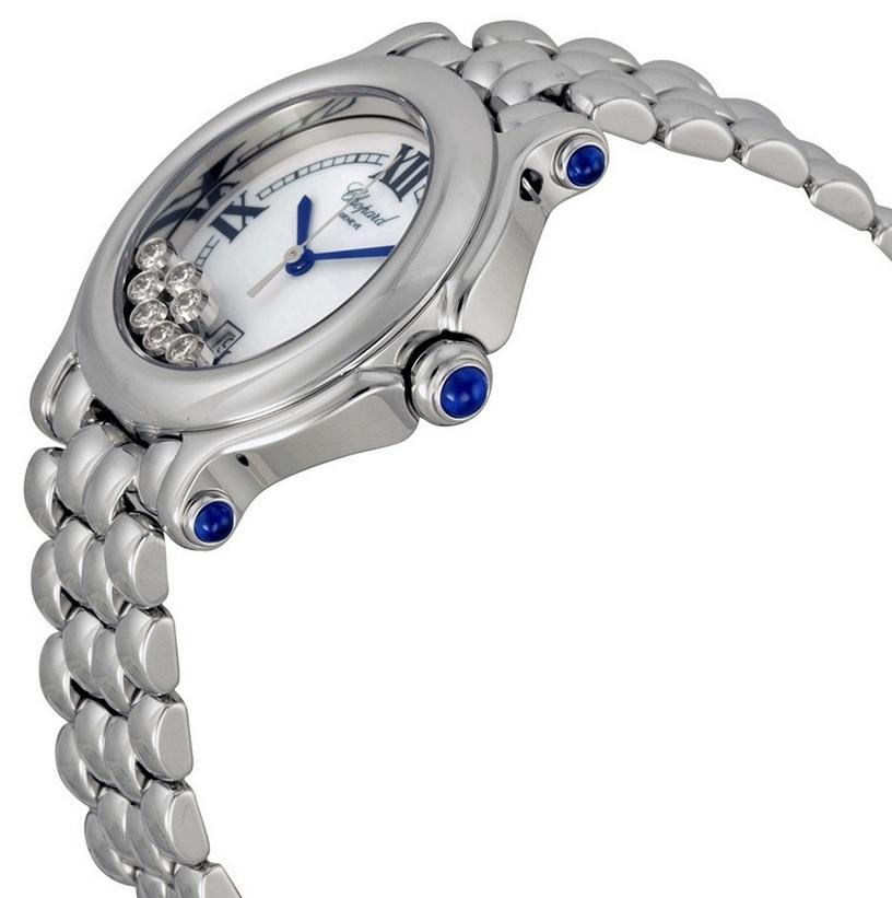 Silver-tone stainless steel case with a silver-tone stainless steel bracelet. Fixed stainless steel bezel. White with 7 floating diamonds dial with blue hands and index hour markers. Roman numerals mark the 3, 6, 9 and 12 o'clock positions. minute