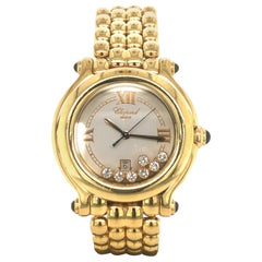 Retro Chopard Happy Sport Ref. 27/6137-23 in 18 Karat Yellow Gold