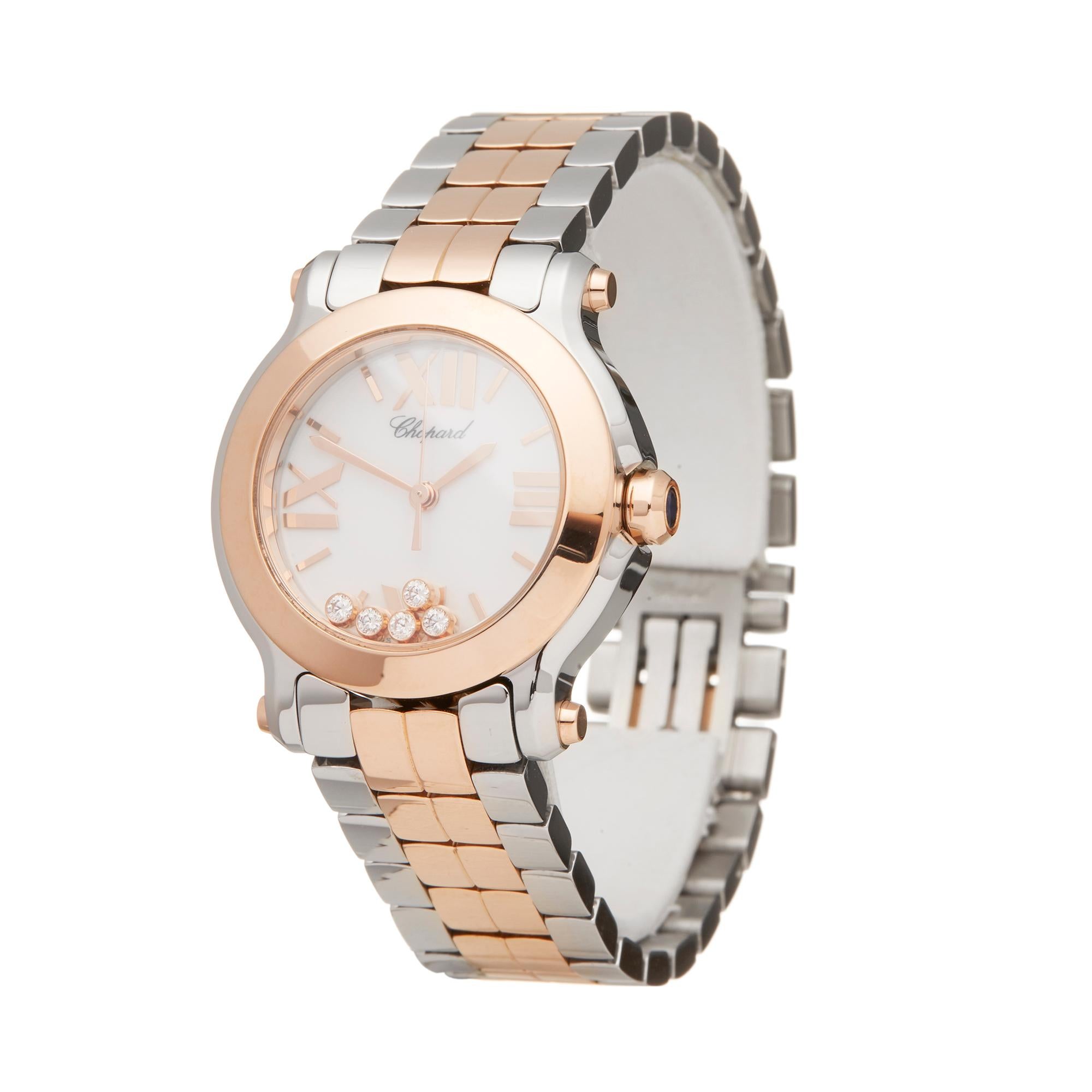 Reference: W5955
Manufacturer: Chopard
Model: Happy Sport
Model Reference: 278509-6003
Age: 11th July 2012
Gender: Women's
Box and Papers: Box, Manuals and Guarantee
Dial: White Roman
Glass: Sapphire Crystal
Movement: Quartz
Water Resistance: To