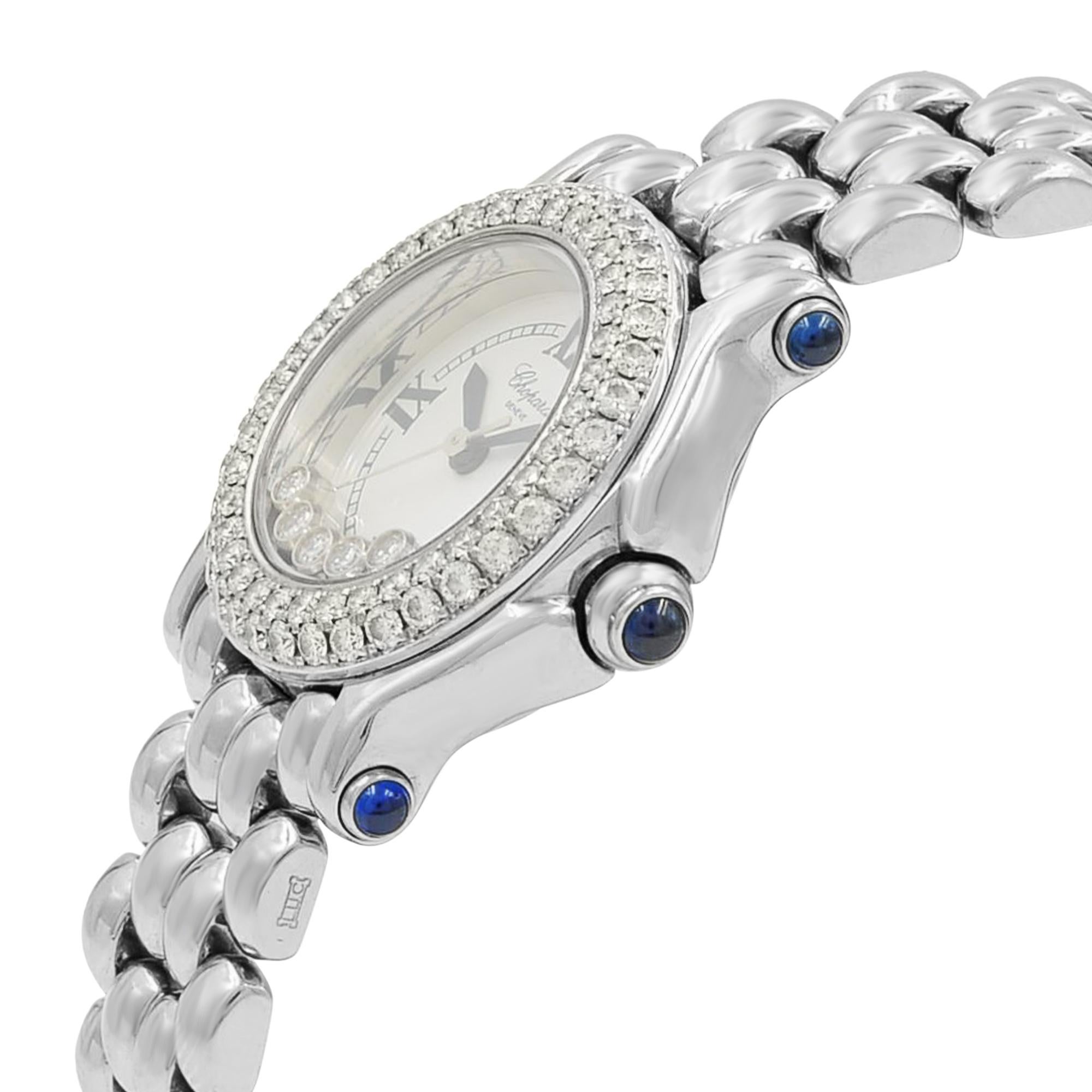 This pre-owned Chopard Happy Sport 27/8294-23 is a beautiful Ladies timepiece that is powered by a quartz movement which is cased in a stainless steel case. It has a round shape face, diamonds dial and has hand roman numerals style markers. It is