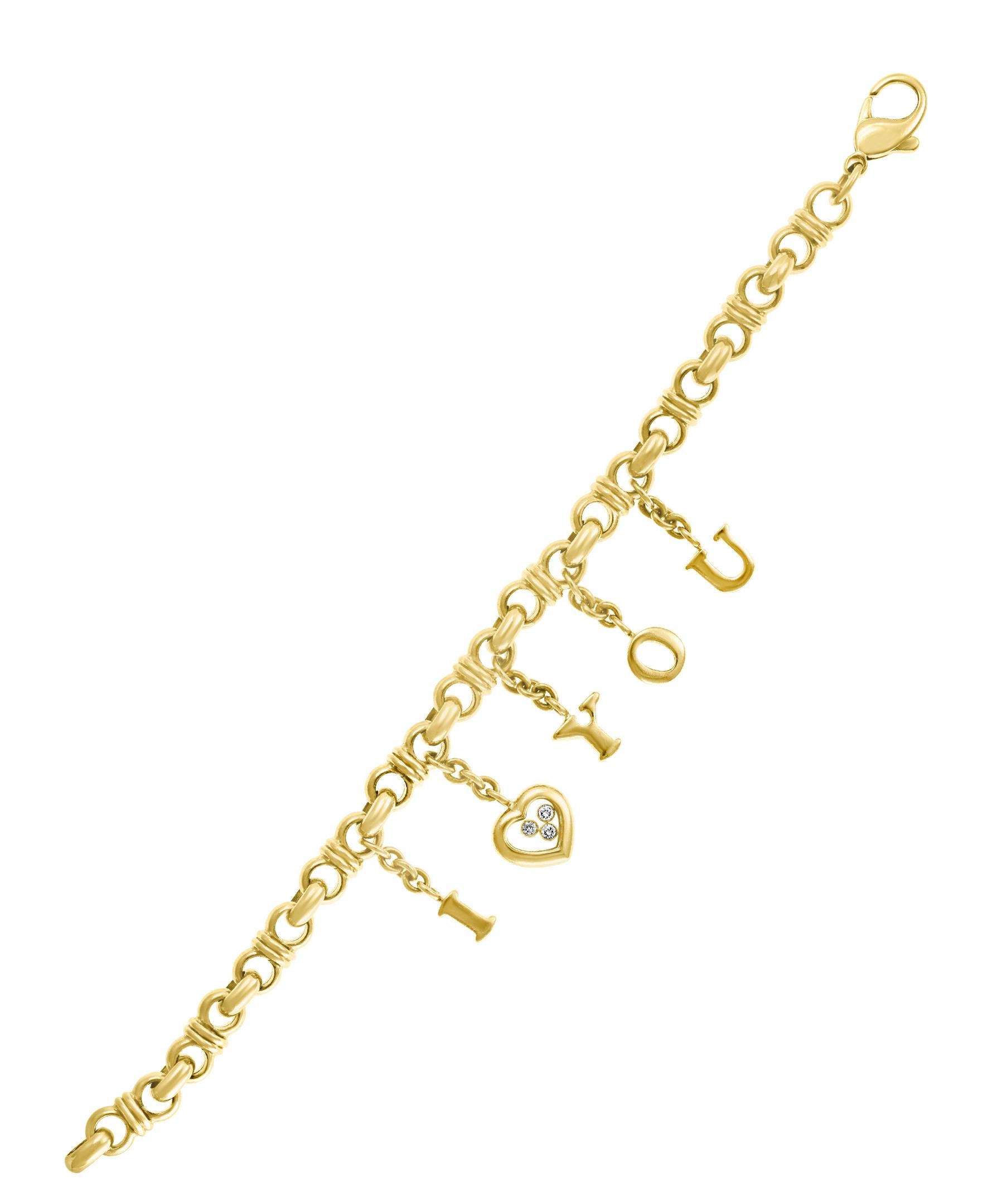 
GORGEOUS!! 18 Karat Yellow Gold Designer  Chopard Happy Diamond “I Love you” Drop Charm Bracelet
Charms are hanging from 18 K gold chain Bracelet.
18 K Yellow Gold 37 Grams
The Diamond weighs 15 points of F-VS1 Quality 
Three floating diamond ,