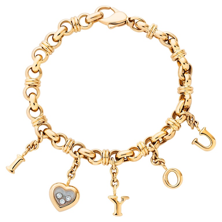 Chopard Bracelet à breloques Happy Diamonds « I Love You » en or jaune 18  carats En vente sur 1stDibs