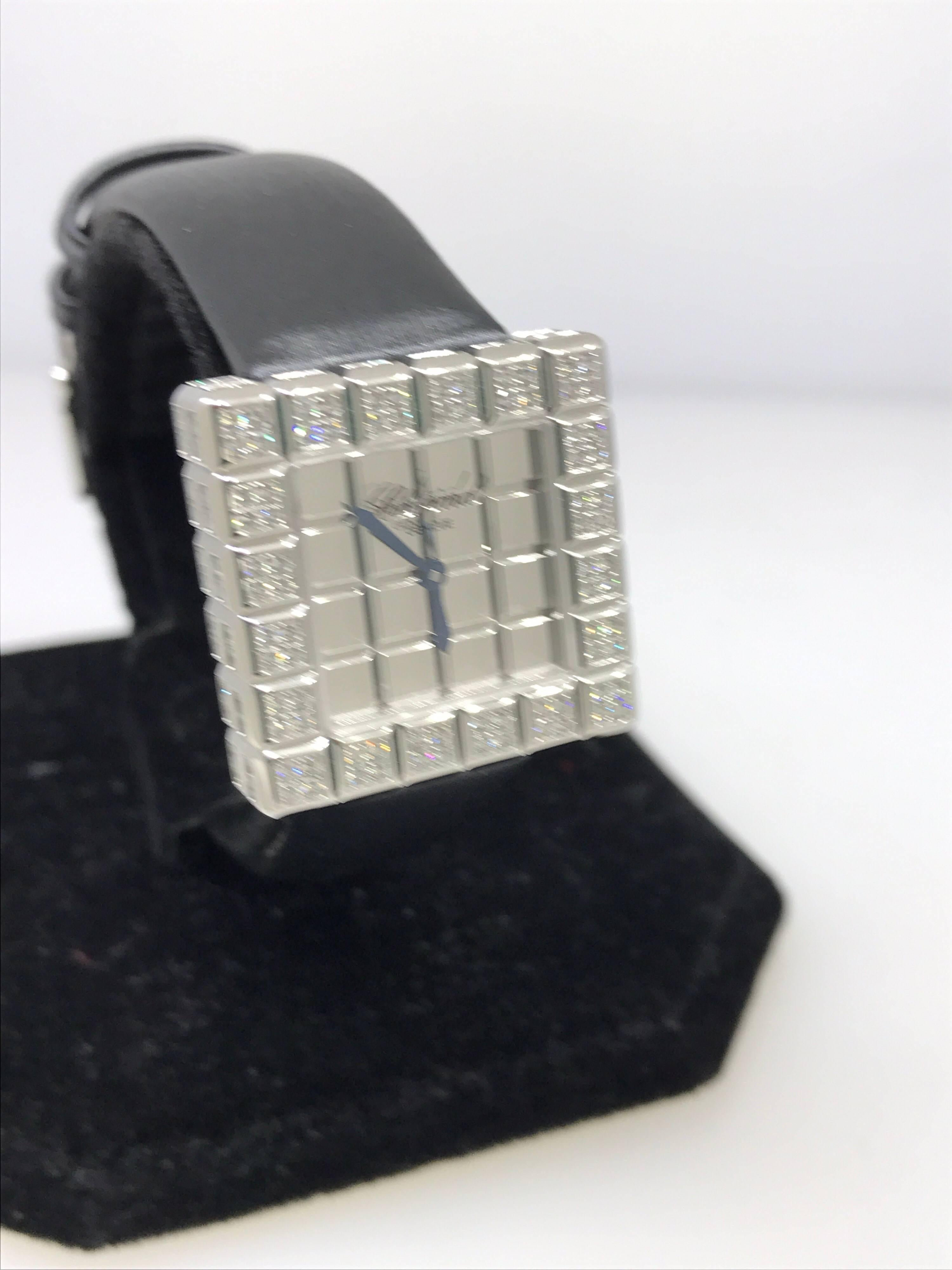 Chopard Ice Cube Lady's Watch

Model Number: 13/6815-1001

100% Authentic

Brand New

Comes with original Chopard box, certificate of authenticity and warranty, and instruction manual

18 Karat White Gold Case & Buckle

Watch Weight: 52gr

White