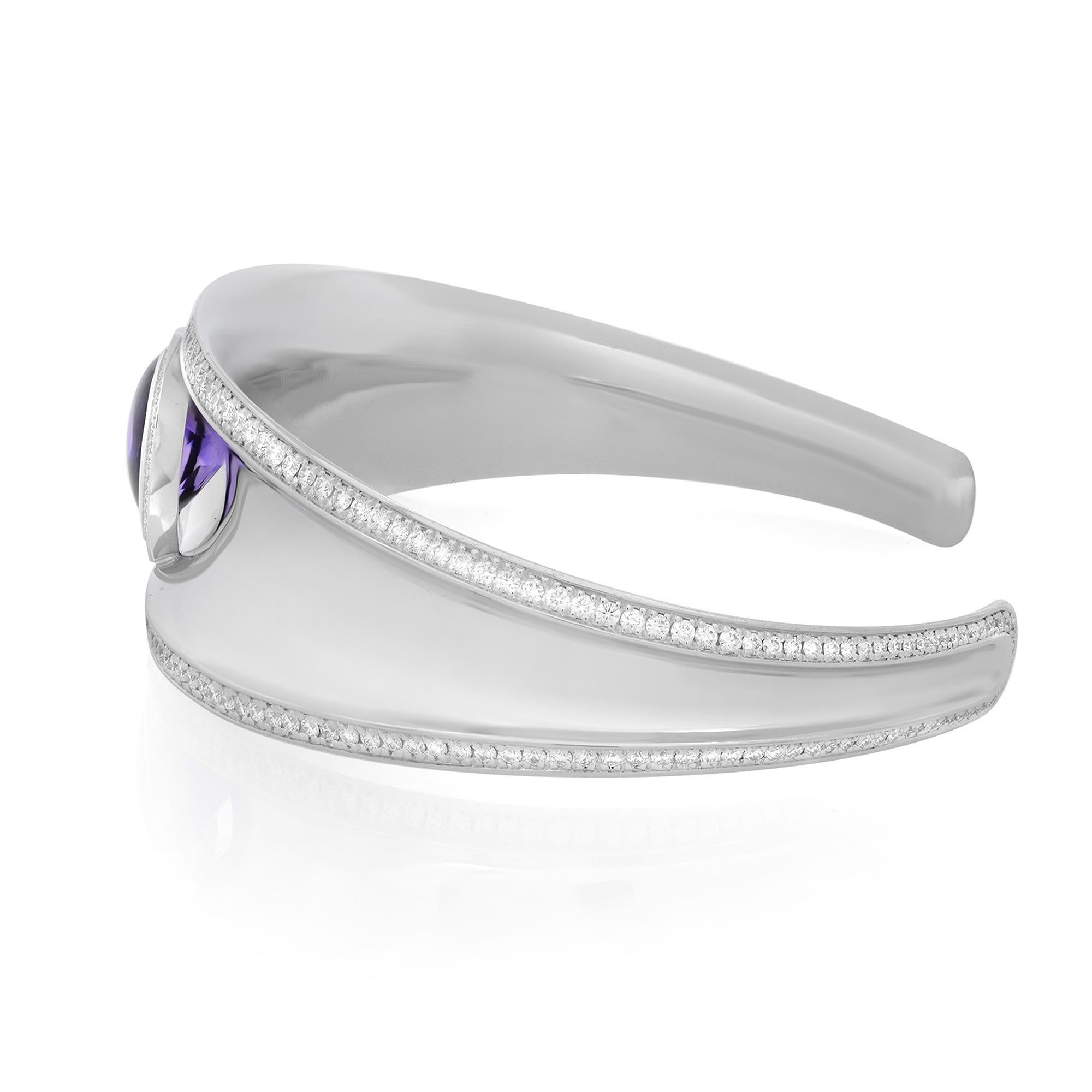 Presenting bold and chic Chopard Imperiale purple Amethyst and diamond cuff bracelet. Crafted in high polished 18K white gold. This beautiful statement piece features a pear shaped Cabochon Amethyst weighing 2.38cttw and bright dazzling pave set 276