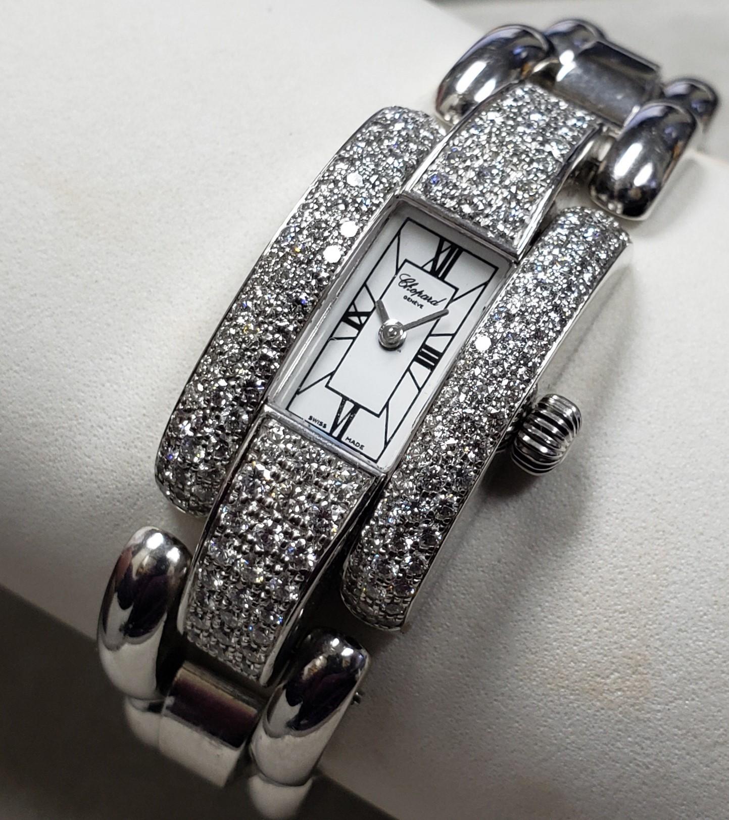 100% authentic Chopard La Strada 533667 ladies Diamond watch 18K White Gold set with collection quality Round Brilliant cut natural diamonds - well matched in color and clarity 3.50CT total weight. 

Watch features:

Size: 41x21MM (41x18MM