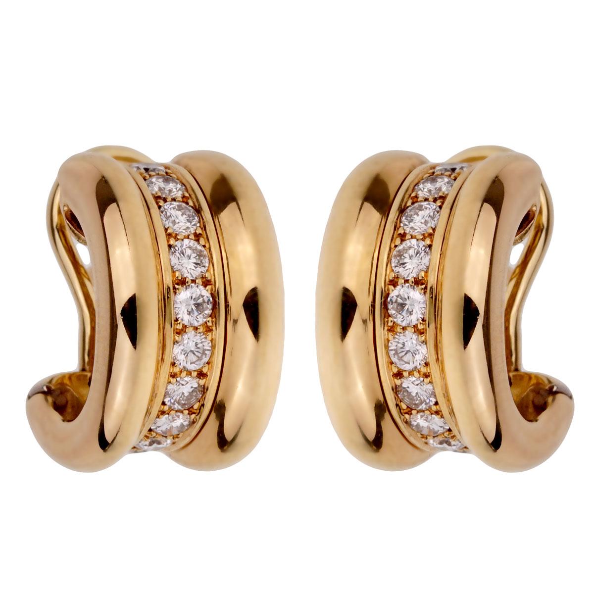 A fabulous classic pair of Chopard diamond earrings, the diamond hoop earrings are adorned with the finest round brilliant cut diamonds in 18k yellow gold.