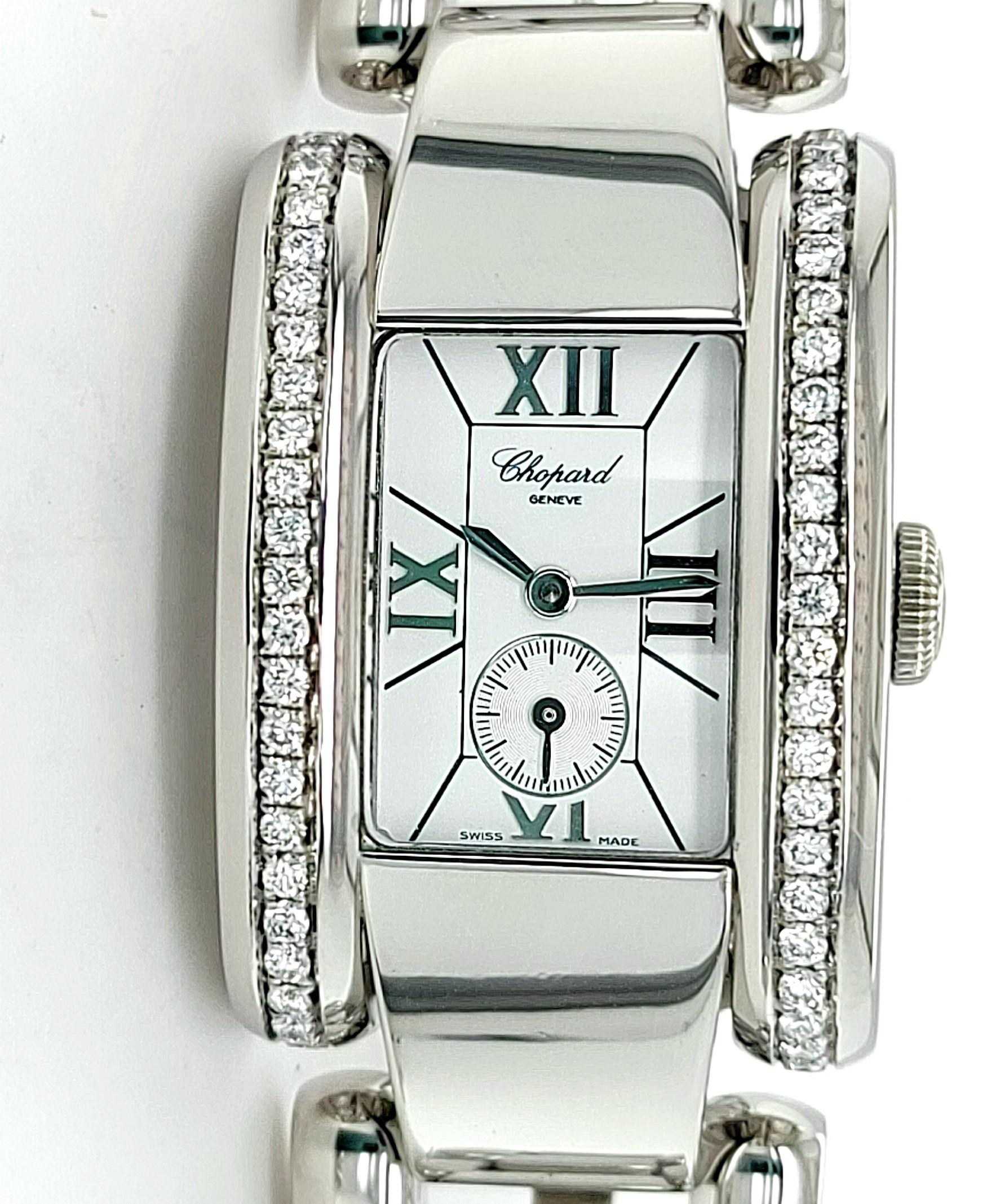 Chopard La Strada Ladies in Steel with Partial Diamond on Bezel, 24 mm

Model: Chopard La strada

Reference number: 8357

Movement: Quartz

Functions: Hours, Minutes, Small seconds

Case: Rectangle,  Stainless steel, measurements case length 24 mm x