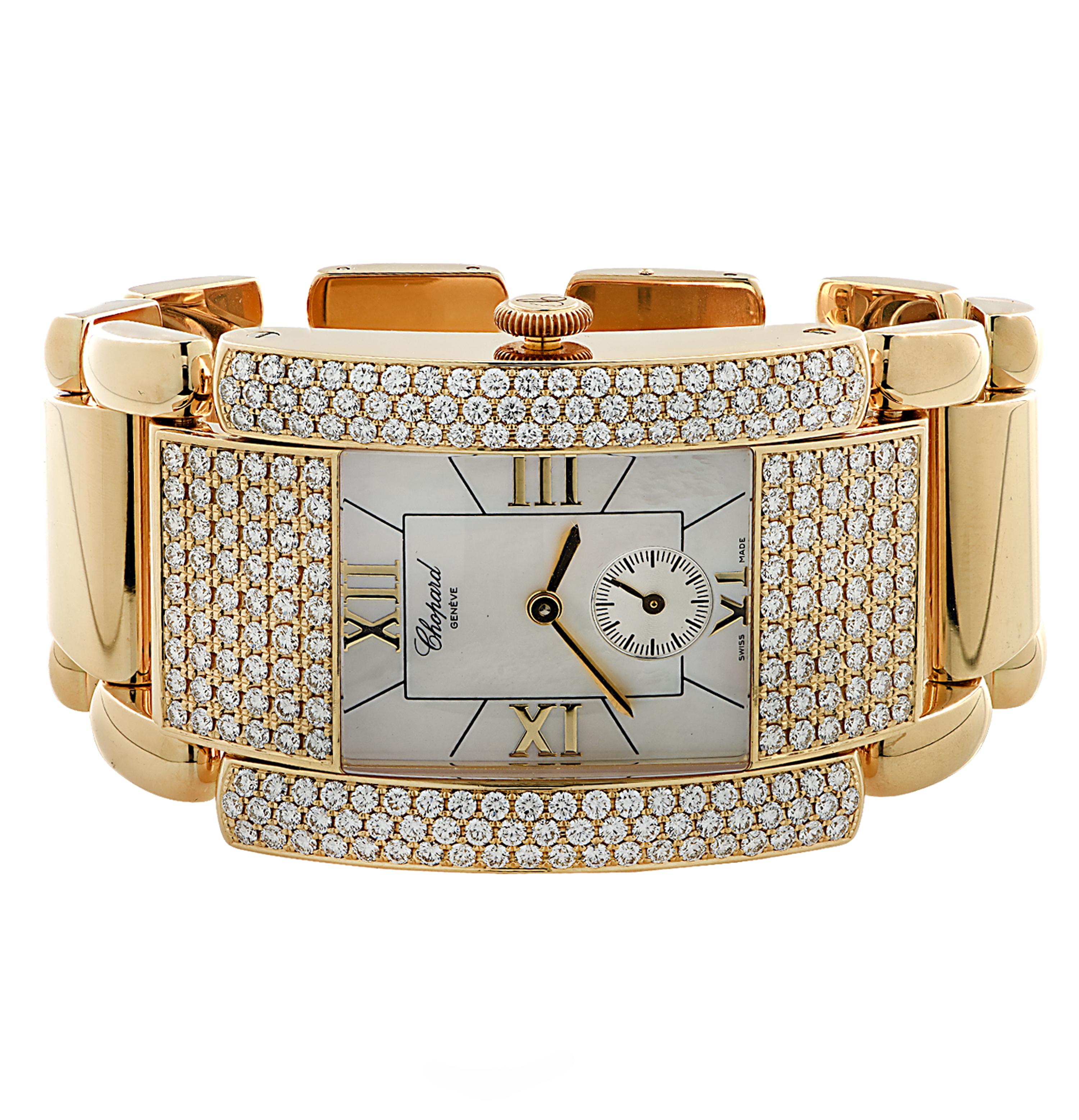 Chopard La Strada Ladies’ Quartz wrist watch crafted in Switzerland in 18 carat yellow gold, featuring 230 round brilliant cut diamonds weighing approximately 5 carats total,  E-F color, VVS-VS clarity. This stunning watch has a mother of pearl