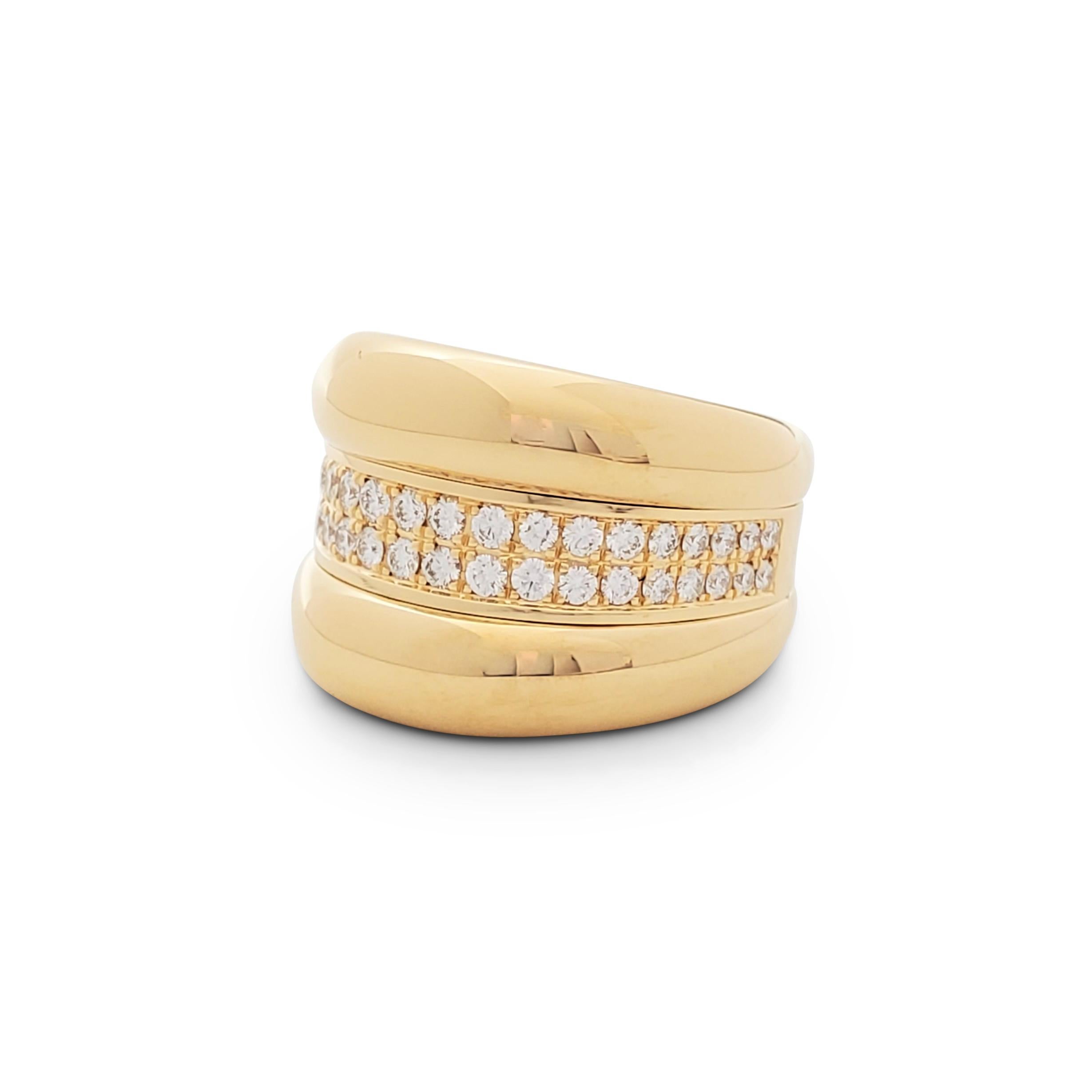 Authentic Chopard 'La Strada' ring crafted in 18 karat yellow gold. The ring is comprised of three sections, the center section set with round brilliant cut diamonds weighing an estimated 0.65 carats (E-F color, VS clarity). Signed Chopard, 750,