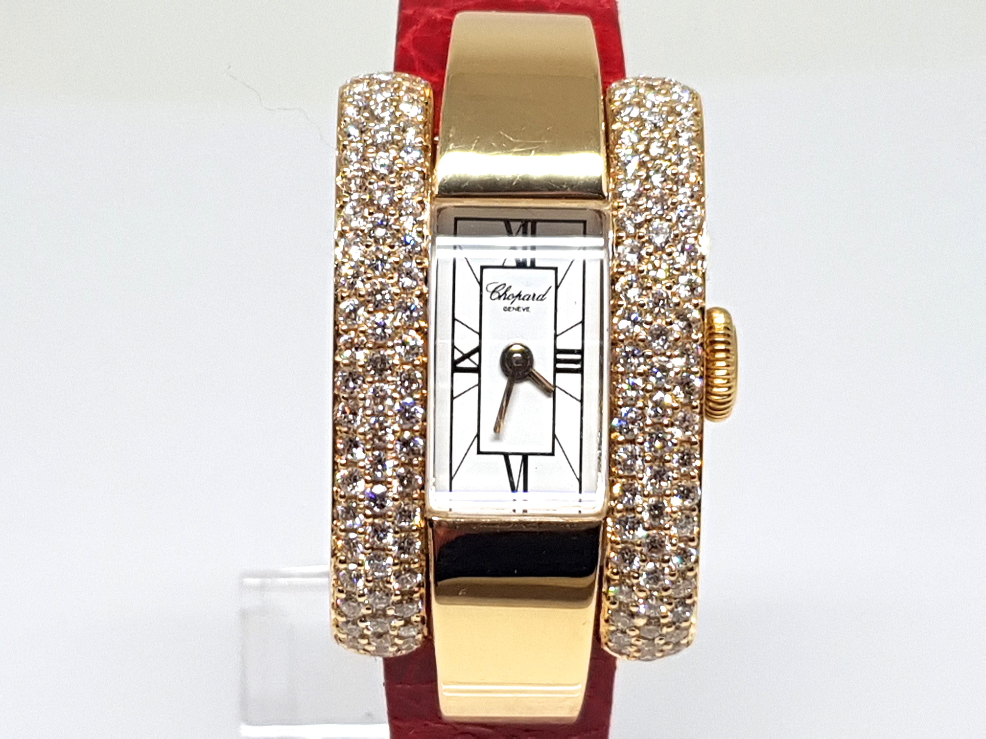 Signed Chopard La Strada ref: 41/7404/8 481548 433 1 
Gold: 18K Yellow Gold 
White Dial 
Quartz Movement 
Weight: 42.46 Grams. 
Diamonds: 2.05ct. 
Width: 2.0 cm. 
Length: 17.0cm. 
All our jewellery comes with a certificate and a 5 year guarantee
