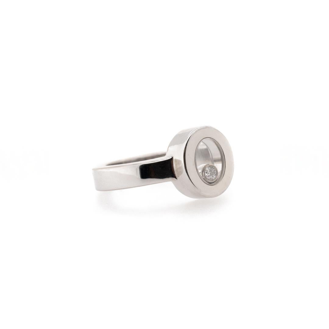 Brand: Chopard

Gender: Ladies

Size: 5.5

Diameter: 8.40 mm

Weight: 8.48 grams

Ladies Chopard 18K white gold diamond cocktail ring with a soft-square shank.  Engraved with 