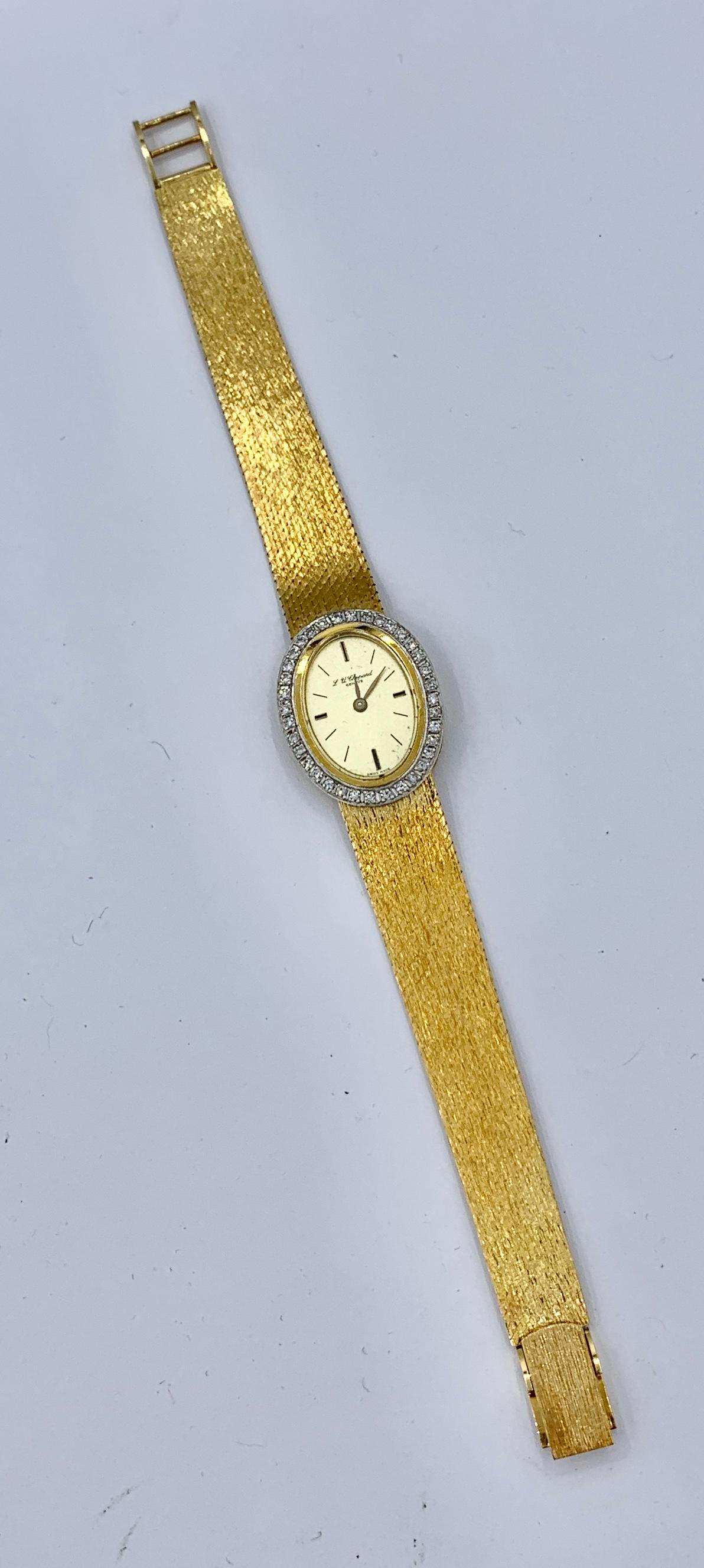 This is a gorgeous Chopard Ladies Diamond Wristwatch in 18 Karat Yellow and White Gold Made in Switzerland.  The stunning and elegant Chopard watch has a diamond surround.  The diamonds are set in 18 Karat White Gold.  The remainder of the watch is