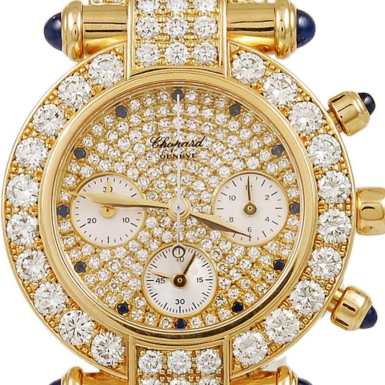 Exuding elegance and class, this 18k yellow gold Imperiale chronograph watch by Chopard is thoroughly embellished with brilliant diamonds, featuring sapphire chapters within a circular-cut diamond bezel and sapphire-set crown and bar lug terminals. 