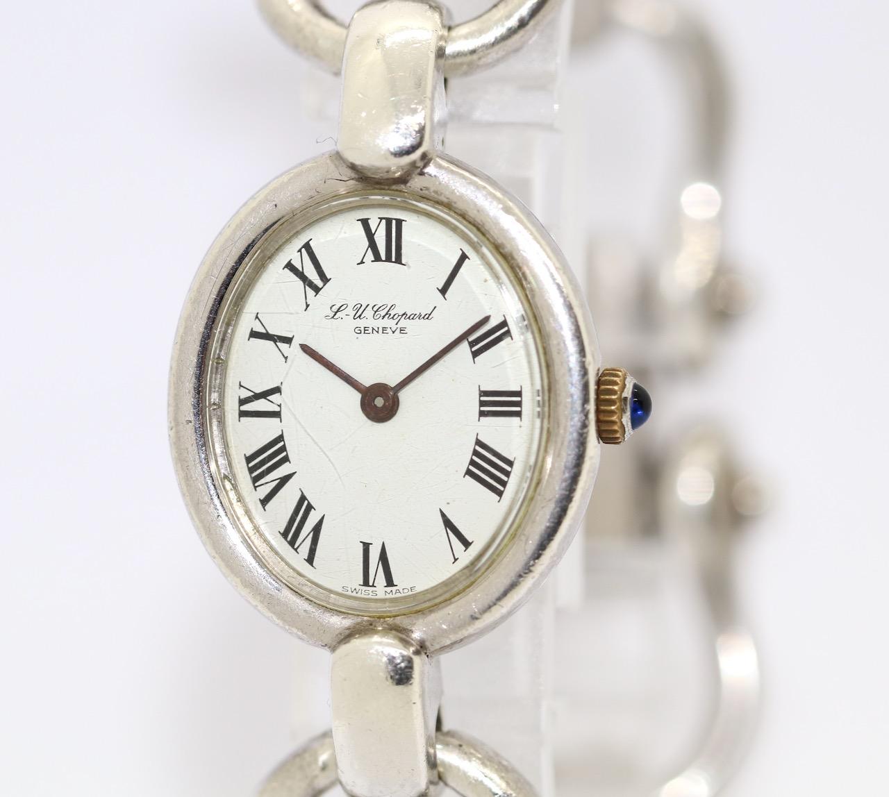 Heavy Chopard Ladies Wrist Watch 925 Sterling Silver 

Case and Strap made of solid 925 Sterling Silver.
Mechanical, manual movement.

Including certificate of authenticity.
