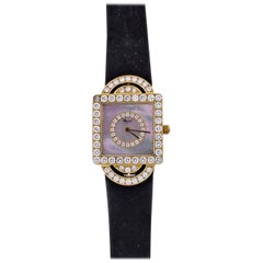 Chopard Montre-bracelet classique pour femme en or jaune avec quartz et diamants