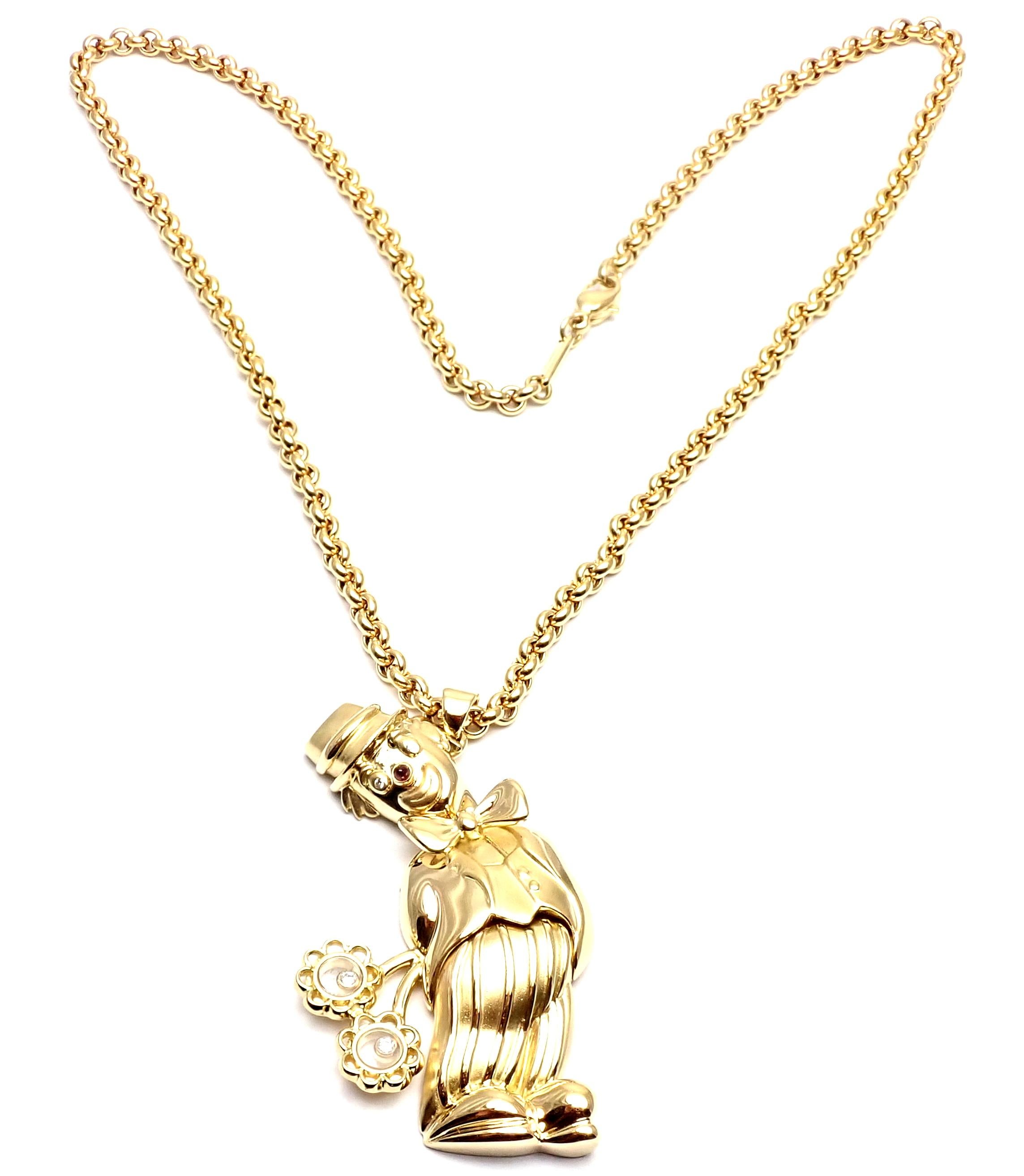 18k Yellow Gold Diamond Large Happy Clown With Flowers Pendant Necklace by Chopard. 
With 4 round brilliant cut diamonds = VVS1 clarity, E color total weight .10ct
1 round ruby
Details: 
Length: 20