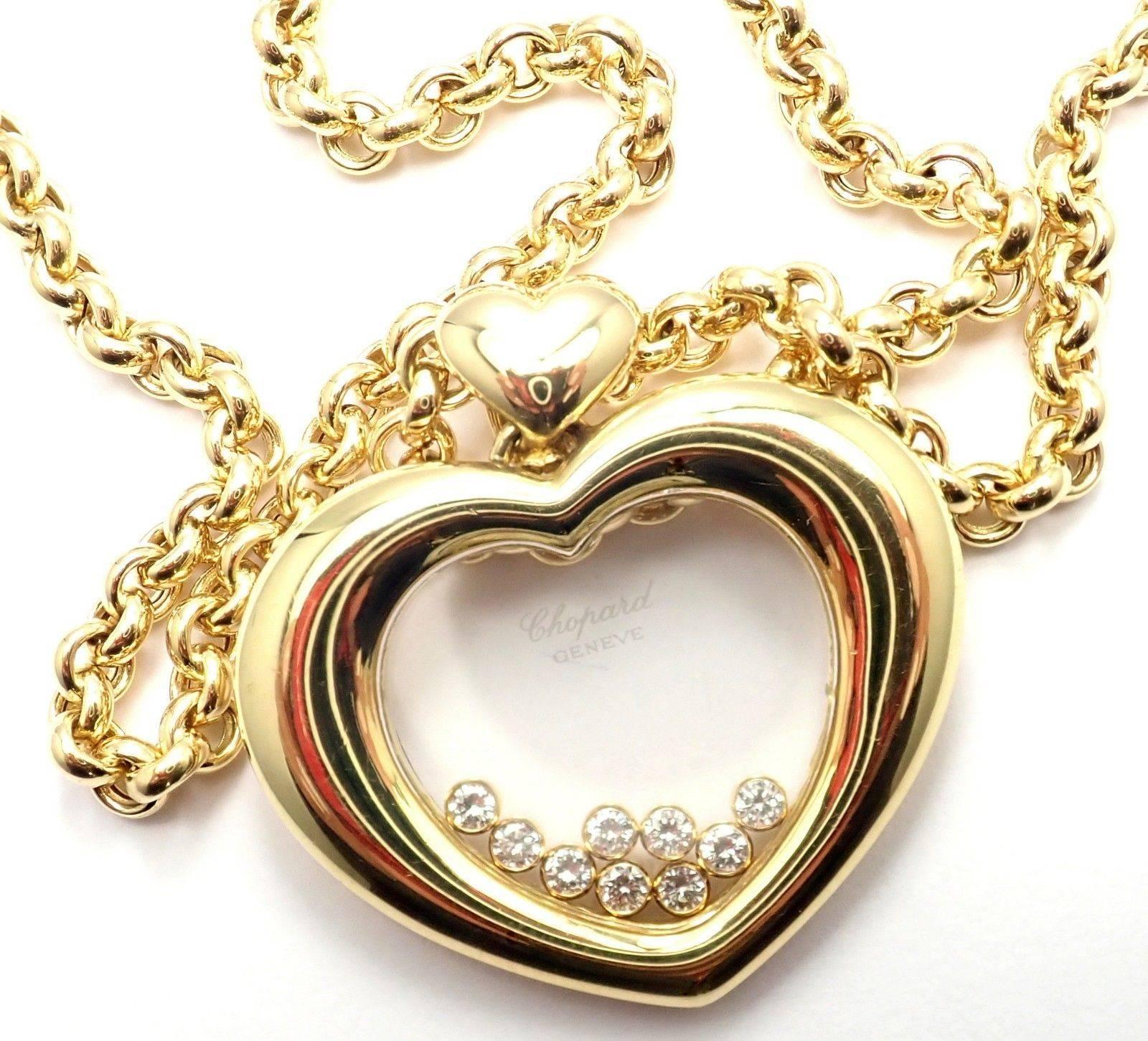 18k Yellow Gold Happy Diamond Large Heart Pendant Necklace by Chopard. 
With 39 round brilliant cut diamonds = VVS1 clarity, E color total weight .58ct
Details: 
Length: 20