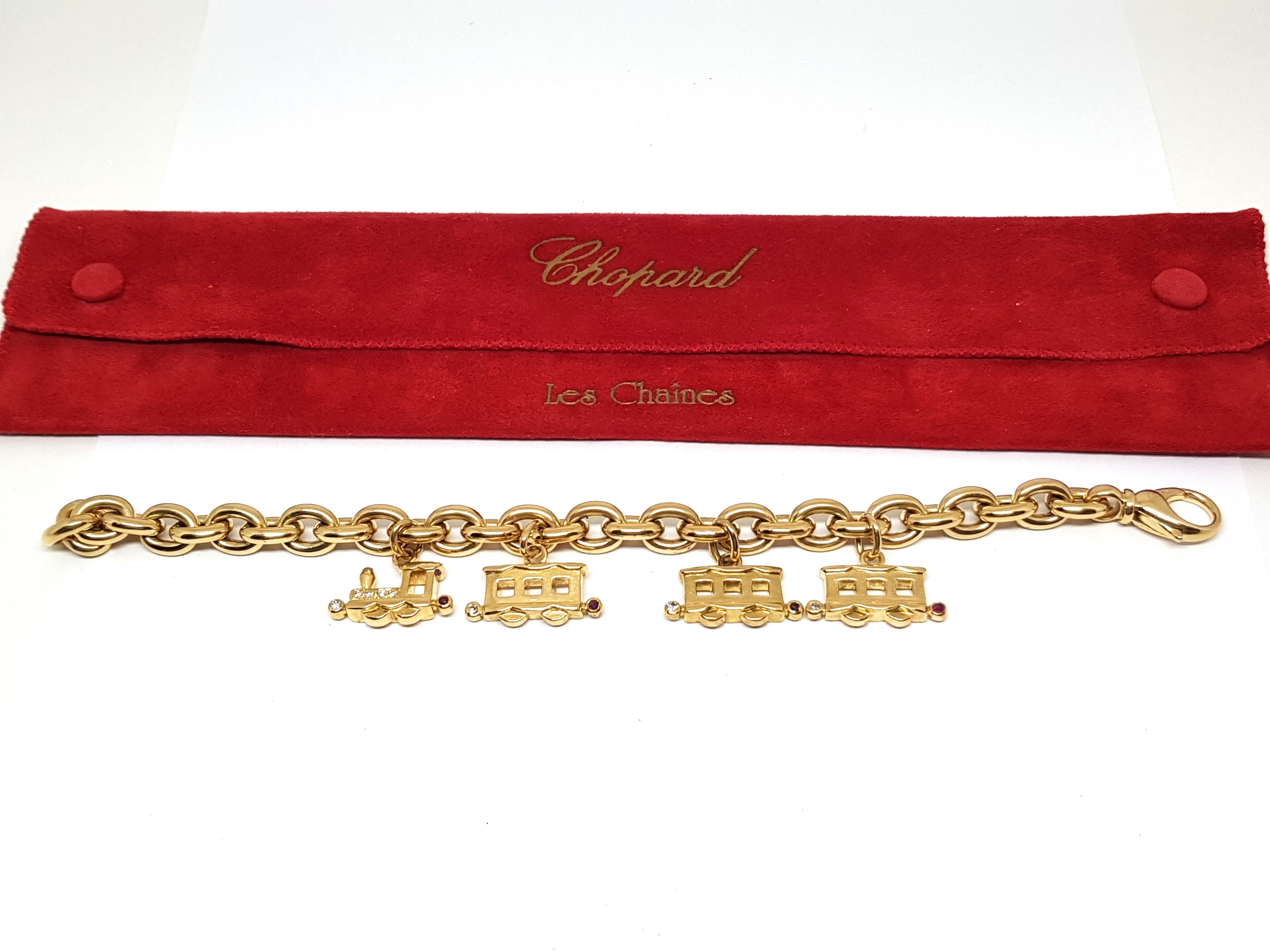 Women's Chopard Les Chaines 18 Karat Yellow Gold Diamond Ruby Charm Bracelet For Sale