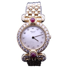 Chopard L'heure Du Diamant, ronde, or jaune 18 carats, diamant, rubis et pierre  Regarder