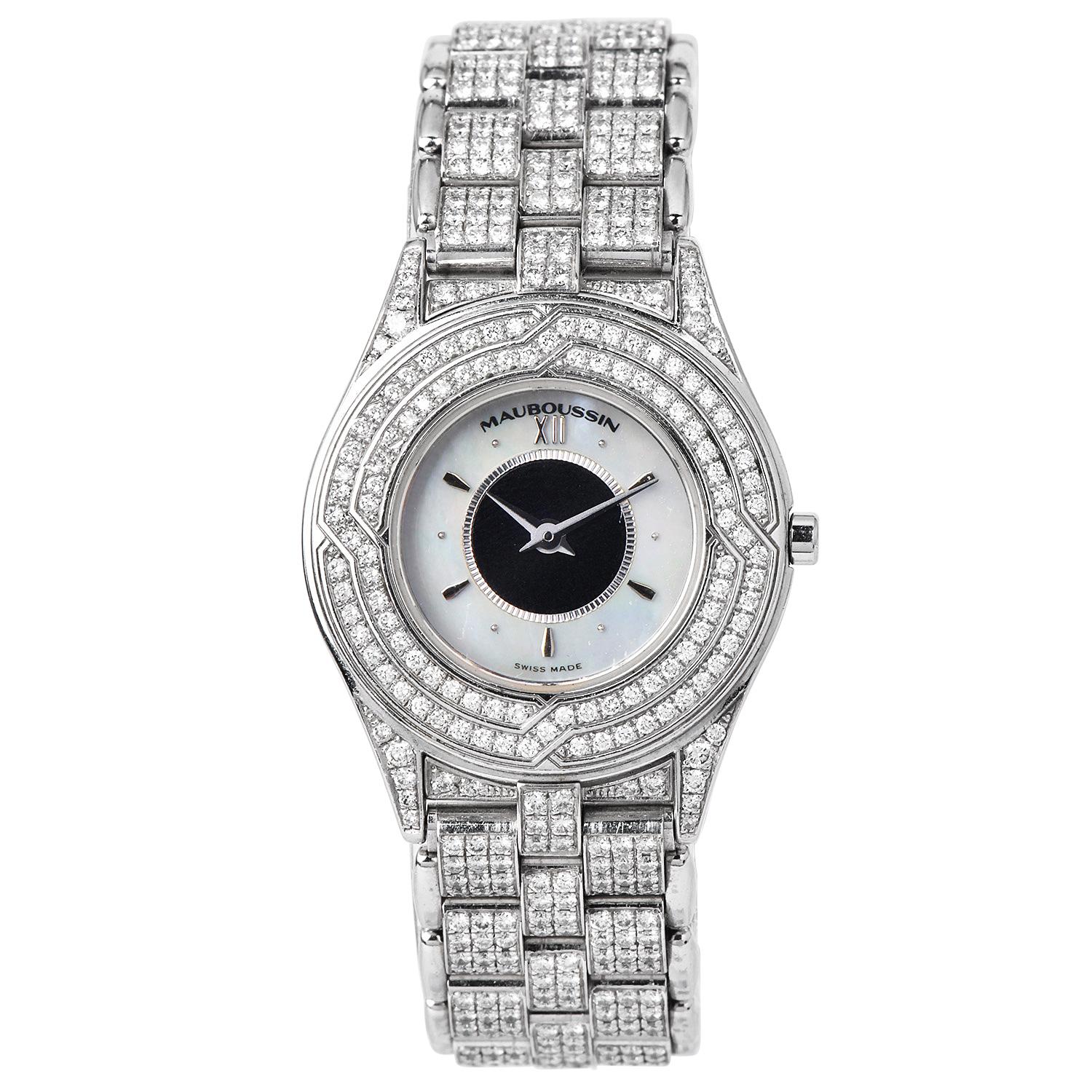 Mauboussin Diamond and Mother-of-Pearl 18K White Gold Wristwatch

18K White Gold, offering a sleek and sophisticated base for the luxurious details.

Set with a stunning mother-of-pearl face, providing a luminous backdrop for the hour