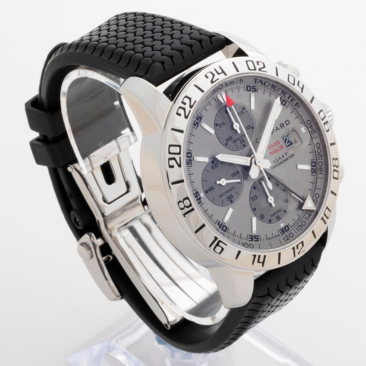 Our rare Chopard Mille Miglia Chronograph GMT features a 42mm stainless steel case with rare and very attractive rhodium grey dial and exhibition case back. Reference 168992 features both chronograph and date as well as GMT function, making this an