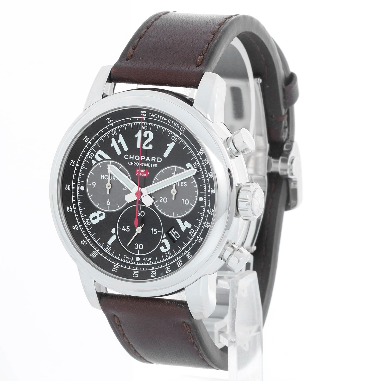 Chopard Mille Miglia Chronograph Men's Steel Watch 8580 - Automatic. Stainless Steel case ( 46mm ). Black dial; Grey sub dials; date in between 4 & 5 o'clock. Brown Chopard leather strap with Chopard deployant buckle. Pre-owned with Chopard box and