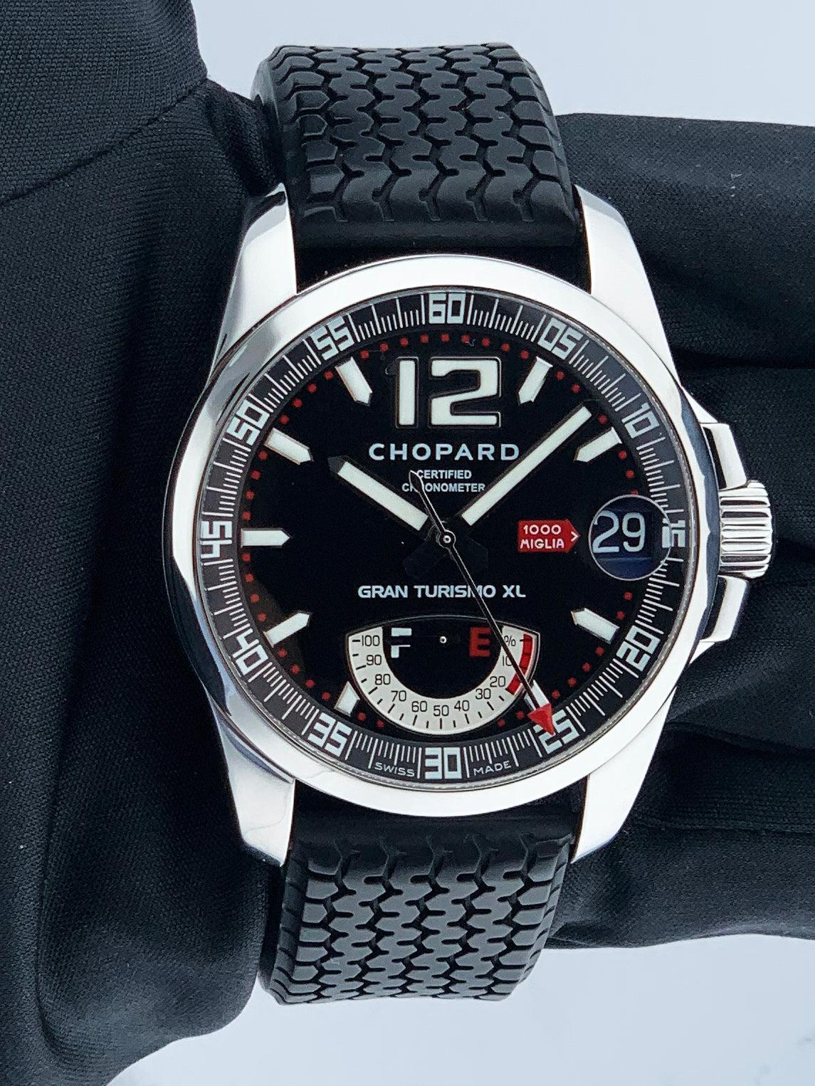 Chopard Mille Miglia GT XL 168457-3001 Mens Watch. 44mm stainless steel case with stainless steel fixed  bezel. Black dial with luminous sliver hands and index hour makers. Arabic numeral at the 12 o'clock position. Minute markers on the outer dial.