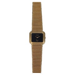 Reloj Chopard Onyx Laykin & Co estampado en oro amarillo de 18 quilates, años 70
