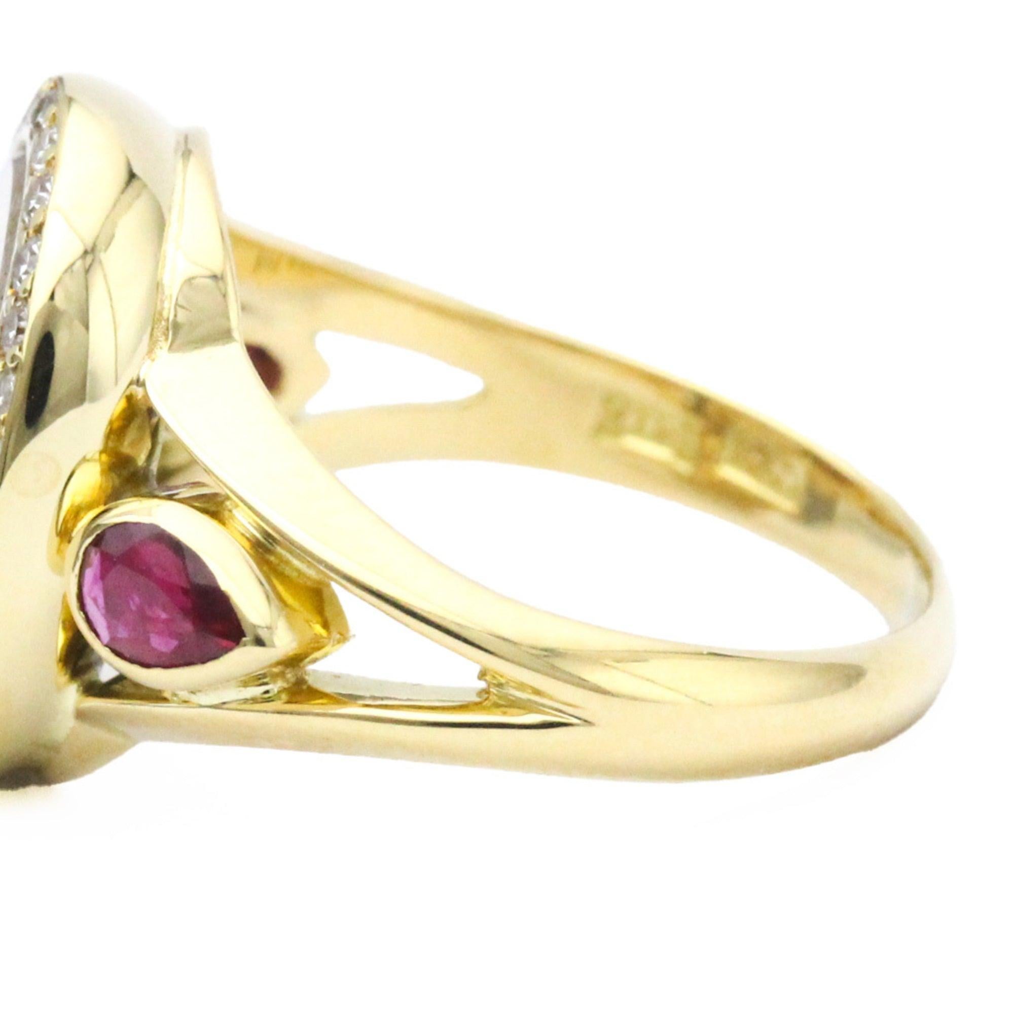 Chopard Oval Diamond, Ruby Band Ring in 18K Yellow Gold 

Additional information:
Brand: Chopard
Gender: Men,Women
Model: happy diamond oval
Gemstone: Diamond, Ruby
Material: Yellow gold (18K)
Ring size (US): 6
Condition detail: This item has been