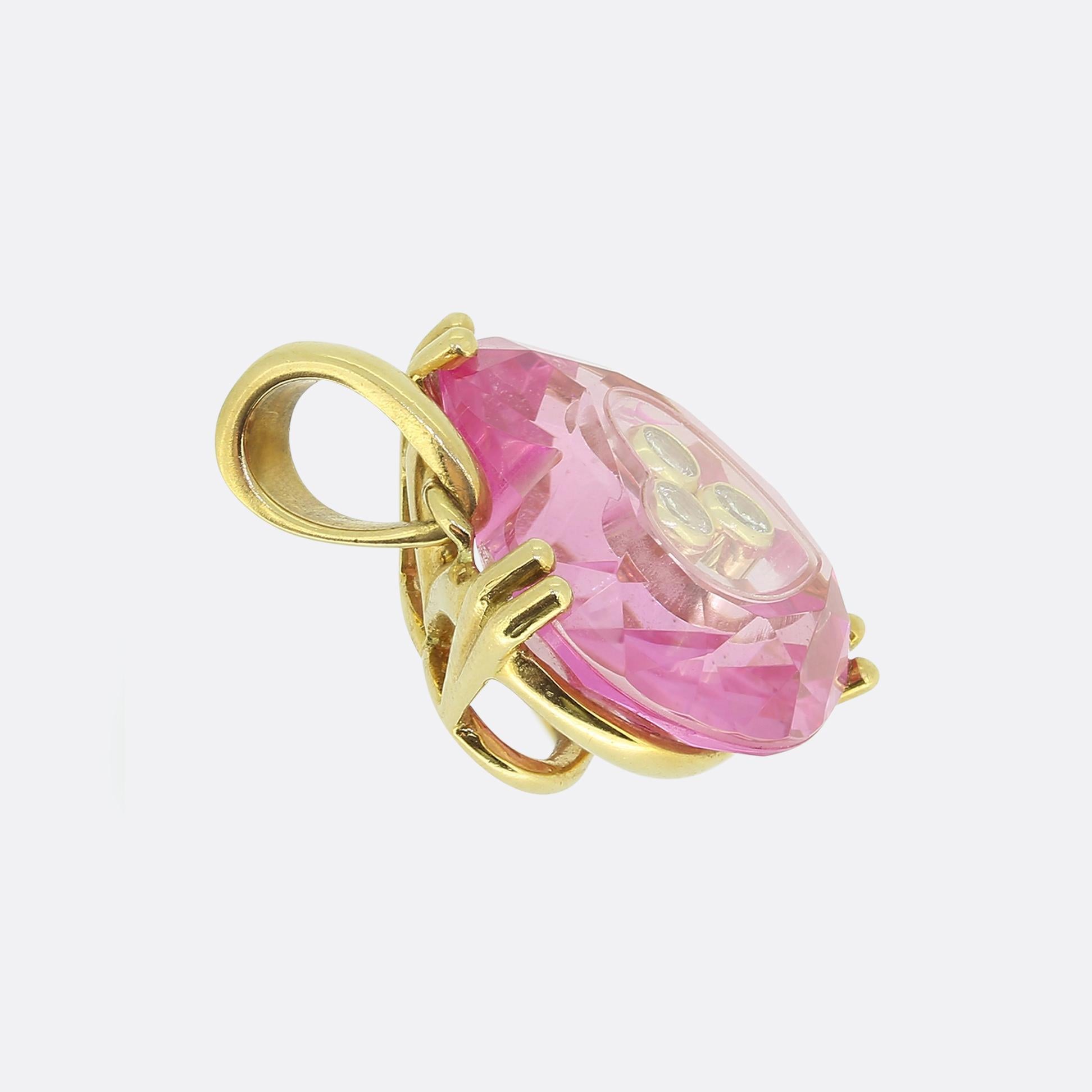 Here we have a stunning pendant from the world renowned French luxury jewellery designer Chopard. The pendant showcases a heart-shaped pink crystal design securely mounted in a rich yellow gold clawed setting with matching bail atop.This romantic