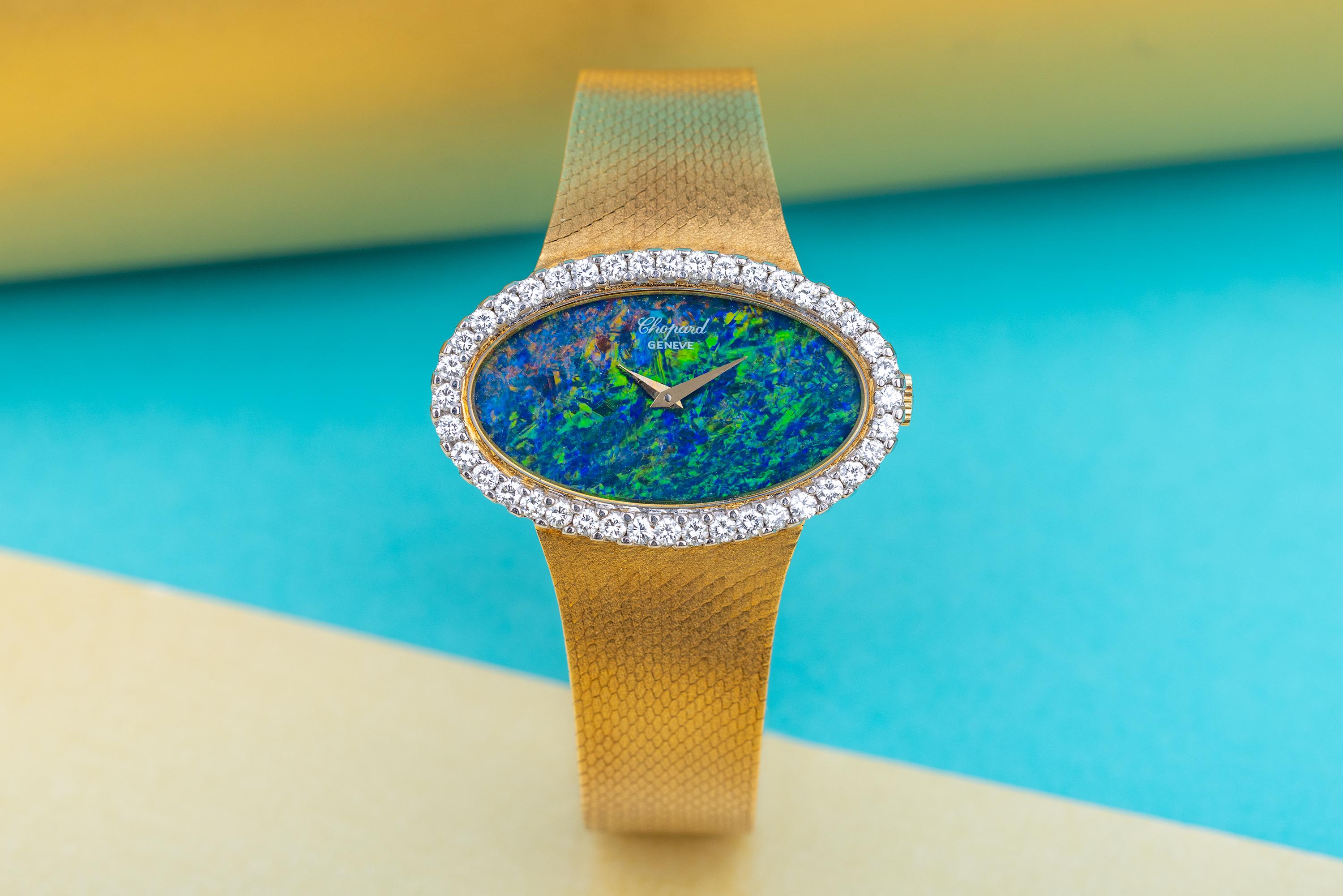 Pre-owned, excellent condition Chopard reference 5053 1, 18k Yellow Gold ladies wristwatch, circa 1970's. Incredible Opal dial, delicate gold hour & minute hands, Chopard logo at 12 o'clock, an 18k Yellow Gold stunning 35mm Oblong case, winder,