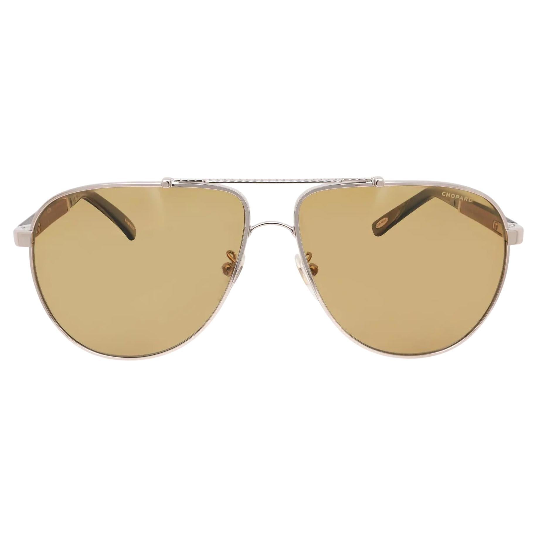Chopard Occhiali da sole con montatura in metallo oro chiaro lucido e lenti polarizzate 95221-0417