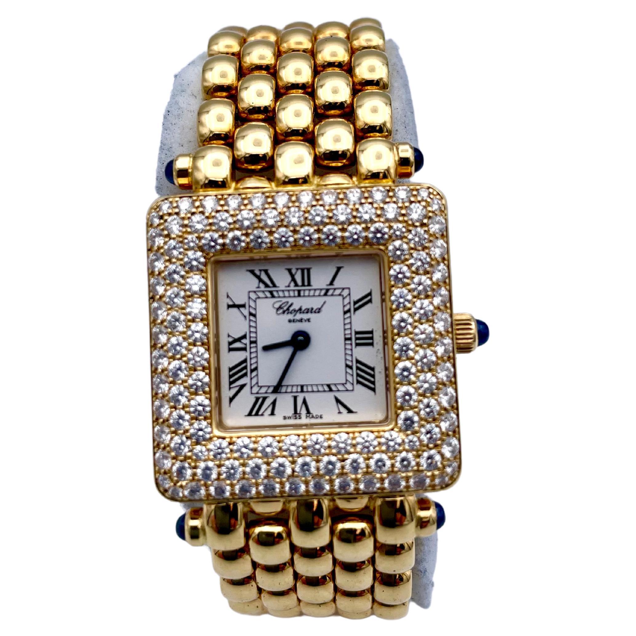 Big and beautiful square diamond watch. Made and signed by CHOPARD.  18K yellow gold.  Set with 12 brilliant full-cut diamonds weighing 2.05 cts.   Case size is 26mm.  Band size is 17mm.  Set with four cabochon sapphires. Cabochon sapphire crown. 