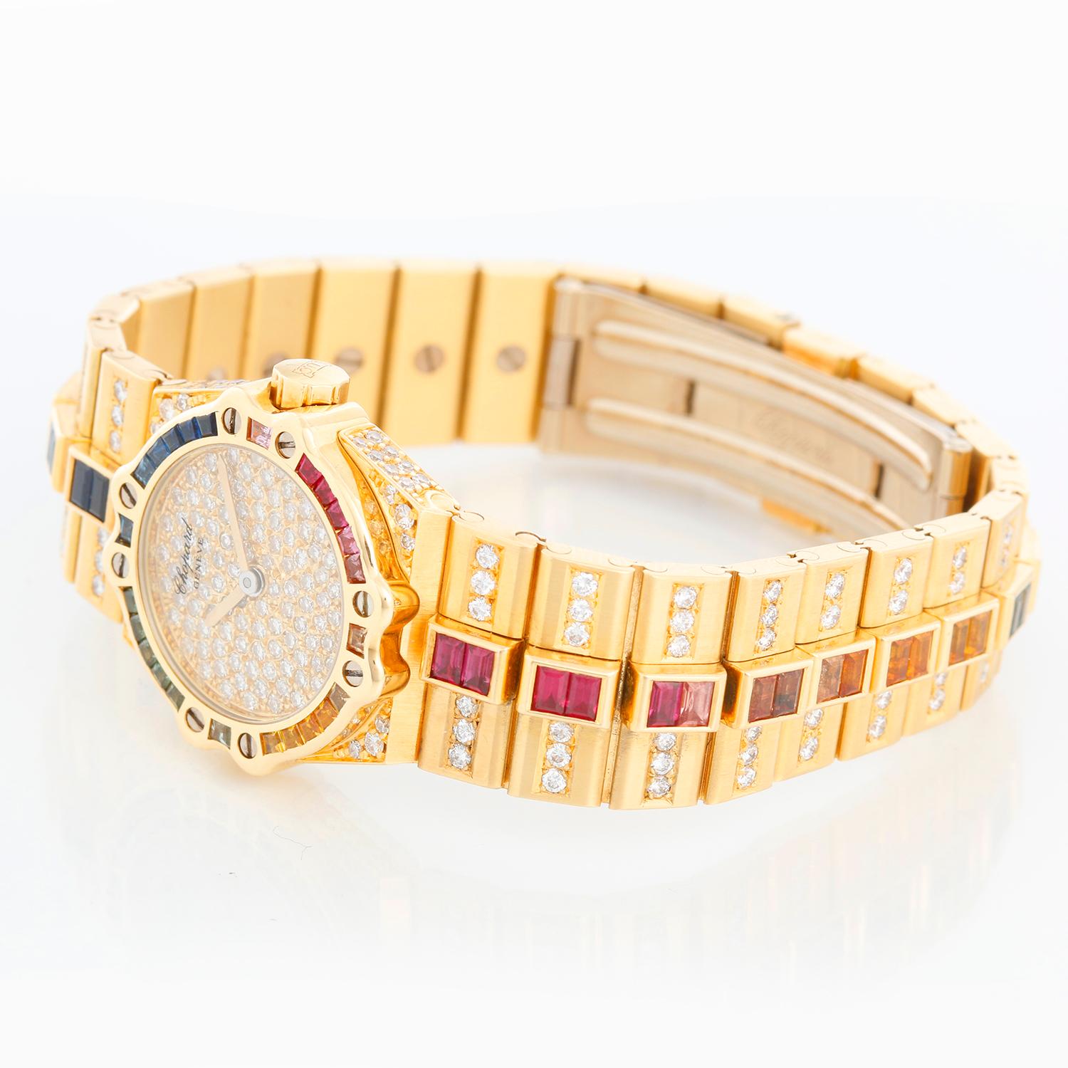 Chopard St. Moritz 18k Yellow Gold Diamond Ladies Watch 25/4334 24 - Quartz. 18K Yellow gold with rainbow bezel ( 24.5 mm ) . Pave Diamond dial . 18k yellow gold link style bracelet with rainbow sapphires (will fit apx. 6 1/2 inch wrist). Pre-owned