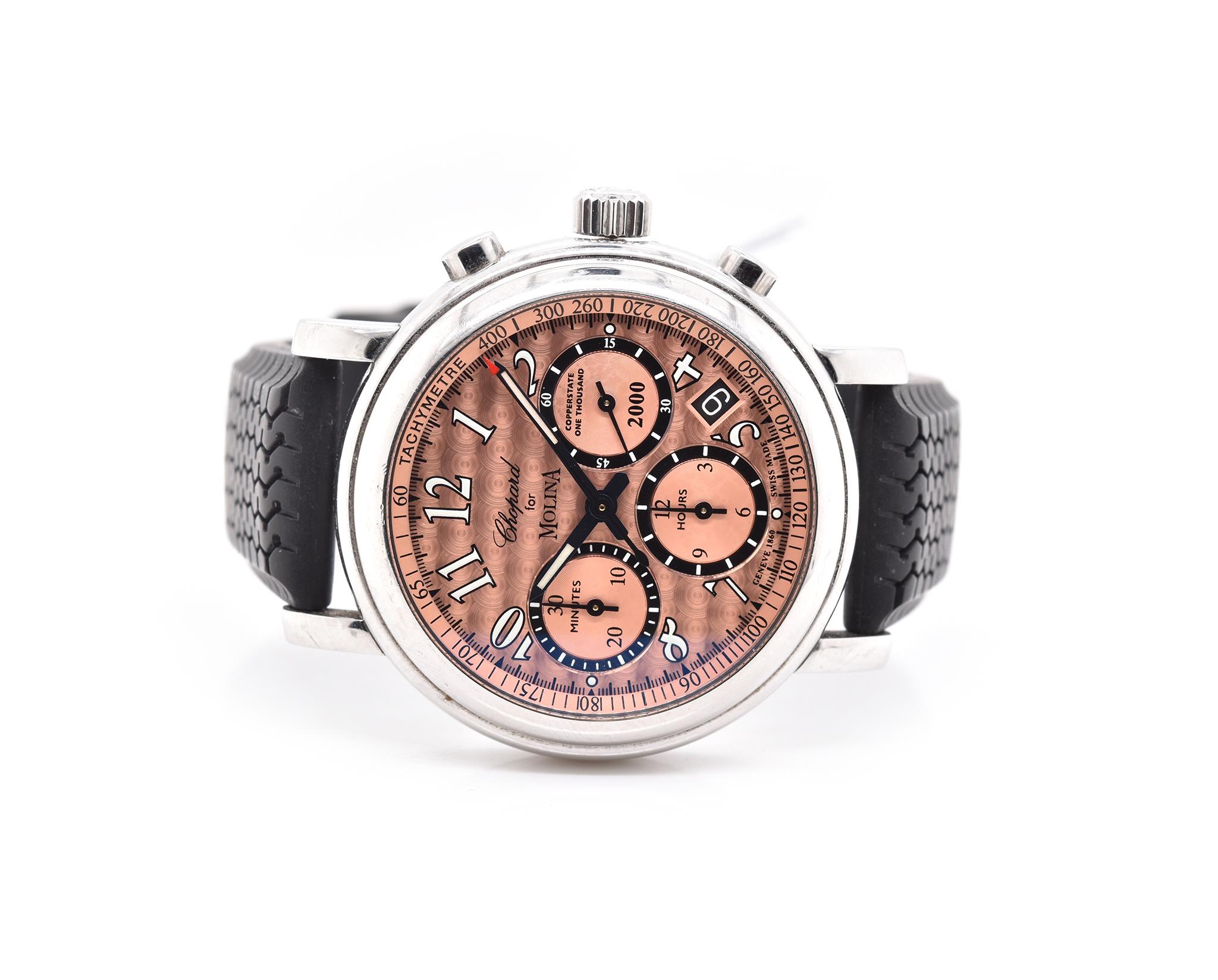 Movement: automatic
Function: hours, minutes, seconds, date, chrono
Case: 38mm case, push/pull crown, sapphire crystal
Band: Chopard black rubber strap with buckle 
Dial: copper arabic dial with chrono
Reference #: 8331
Serial: 718XXX   50/100

No